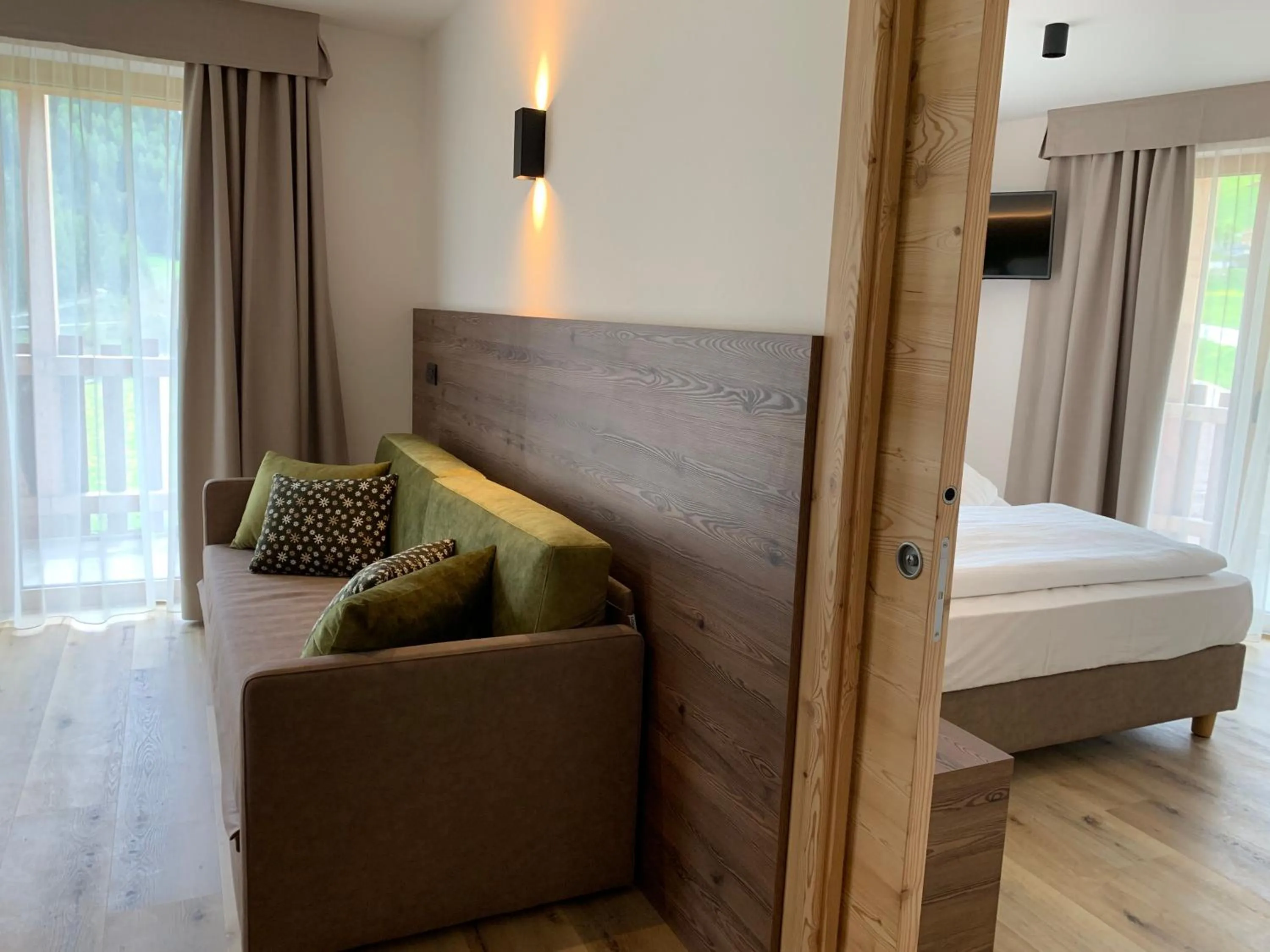 Living room, Bed in Hotel Miravalle