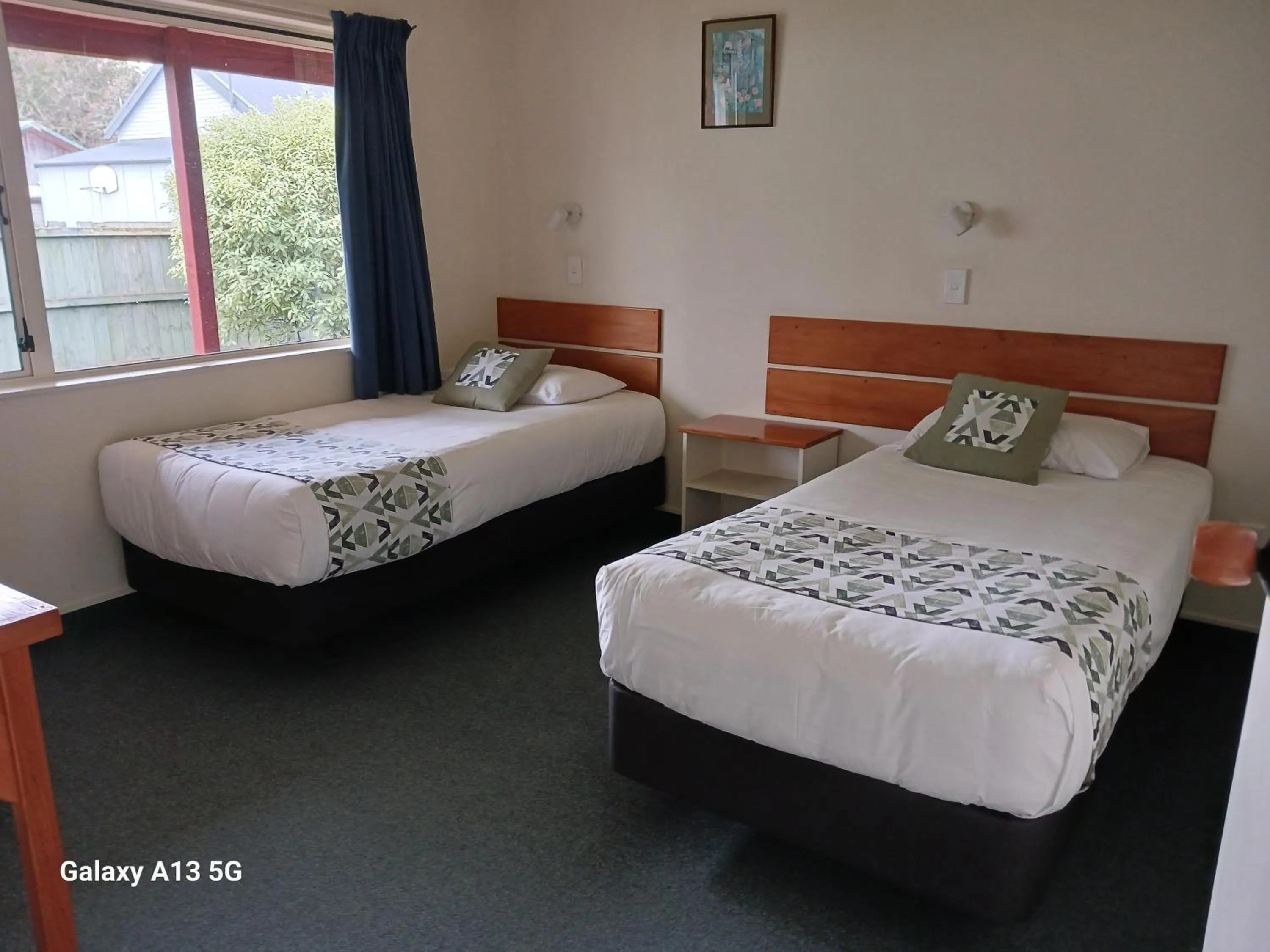 Bed in Anatoki Lodge Motel