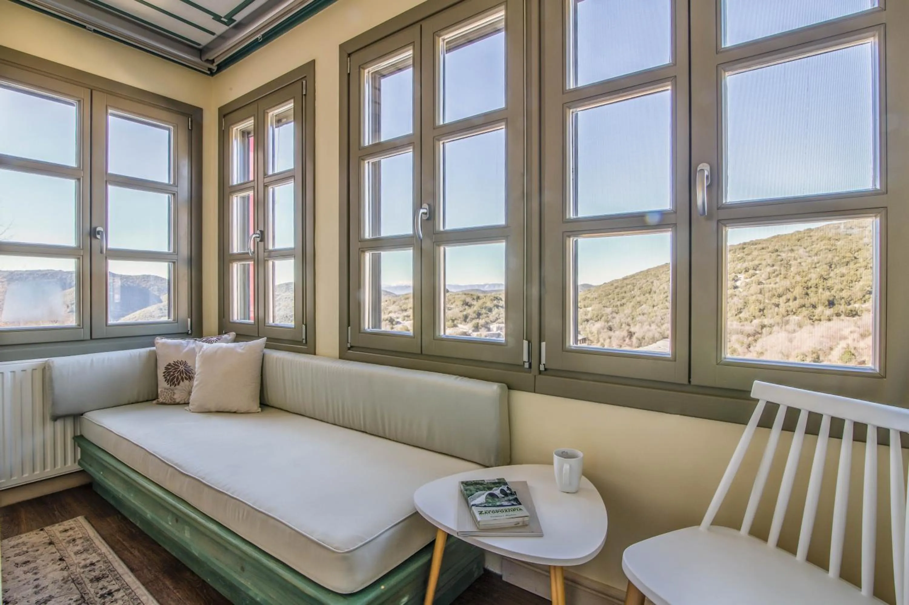 Living room, Bed in Pirrion Wellness Boutique Hotel