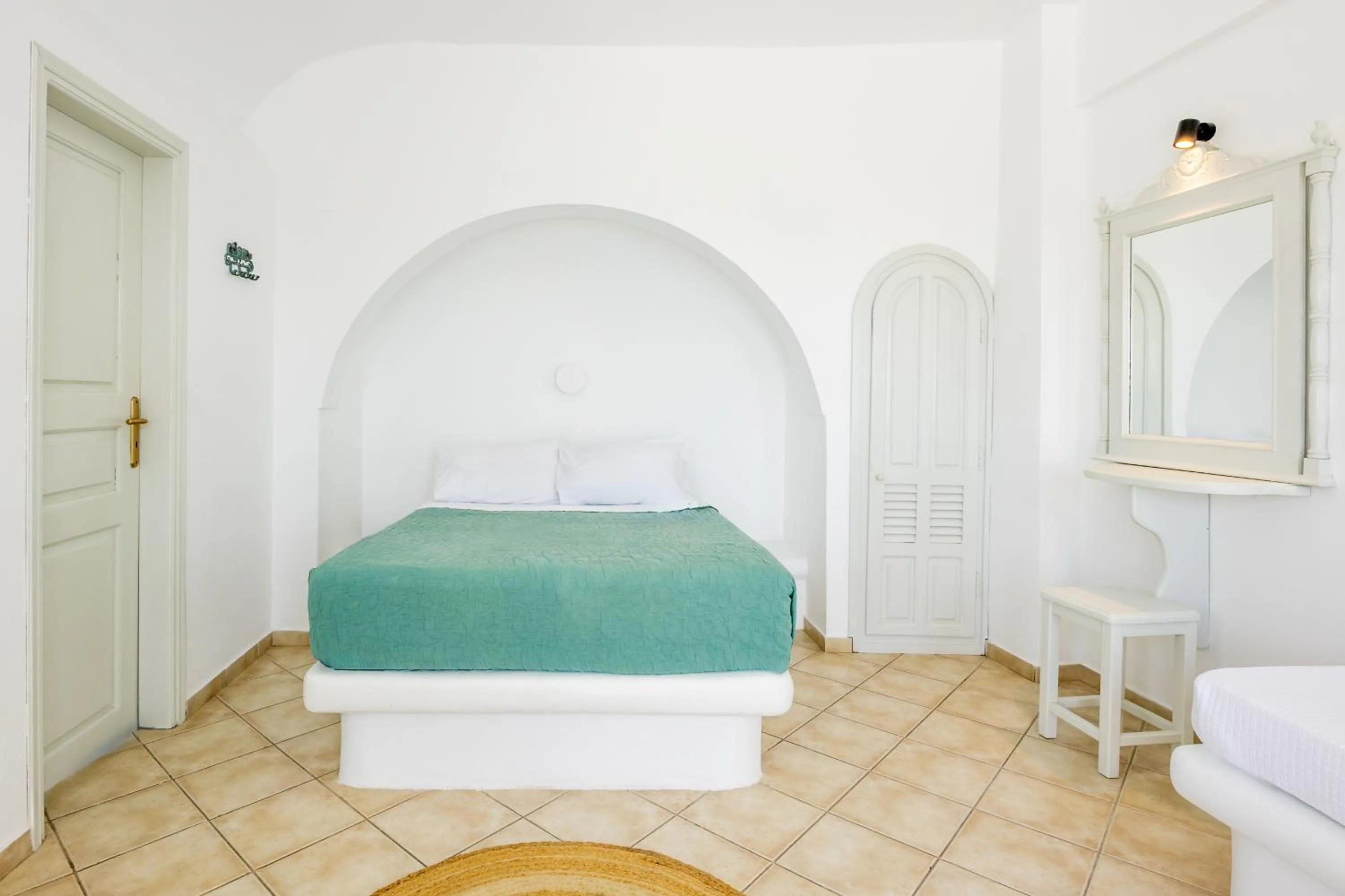 Bed in Ilioperato Hotel