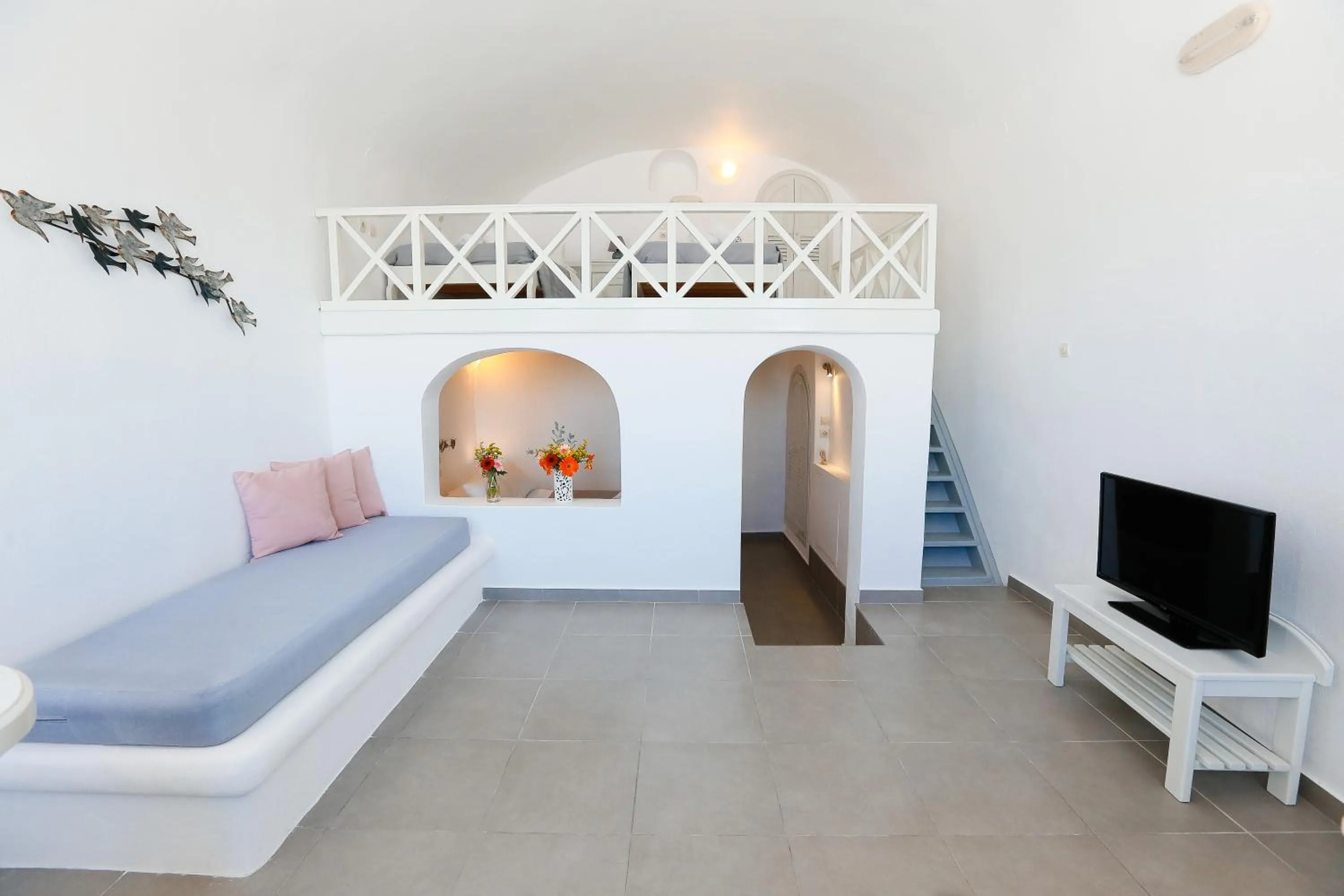 Seating area, Bed in Ilioperato Hotel