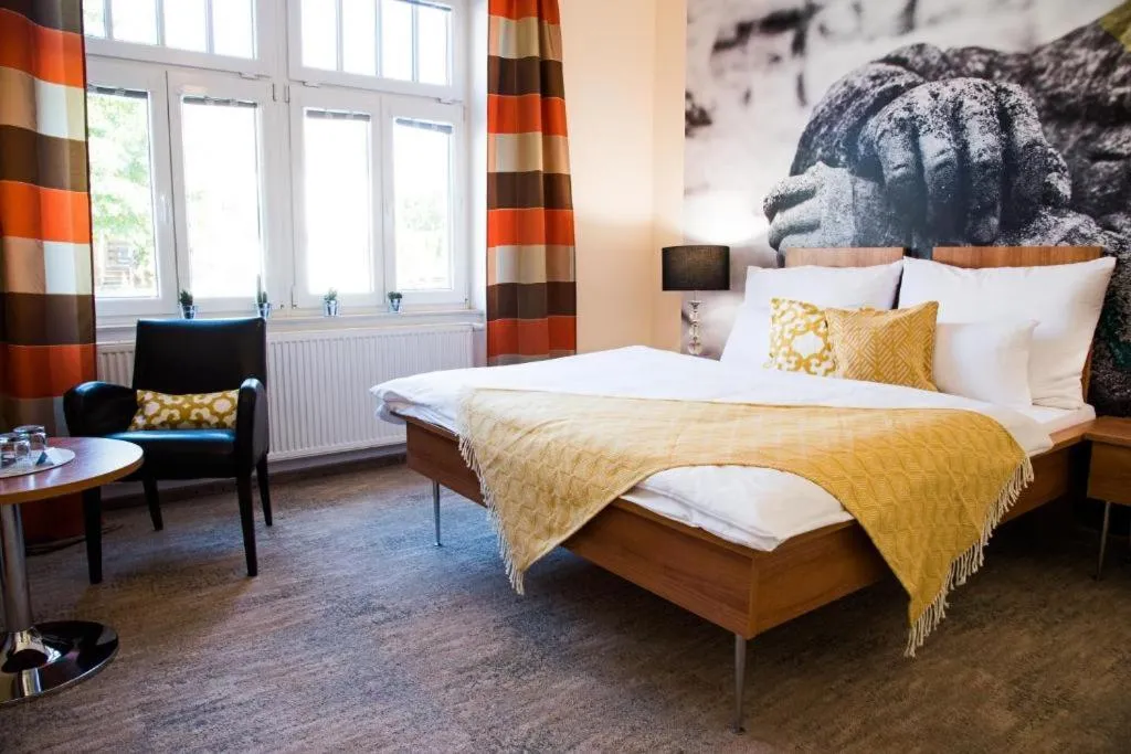 Bed in Boutique Hotel Golf Garni