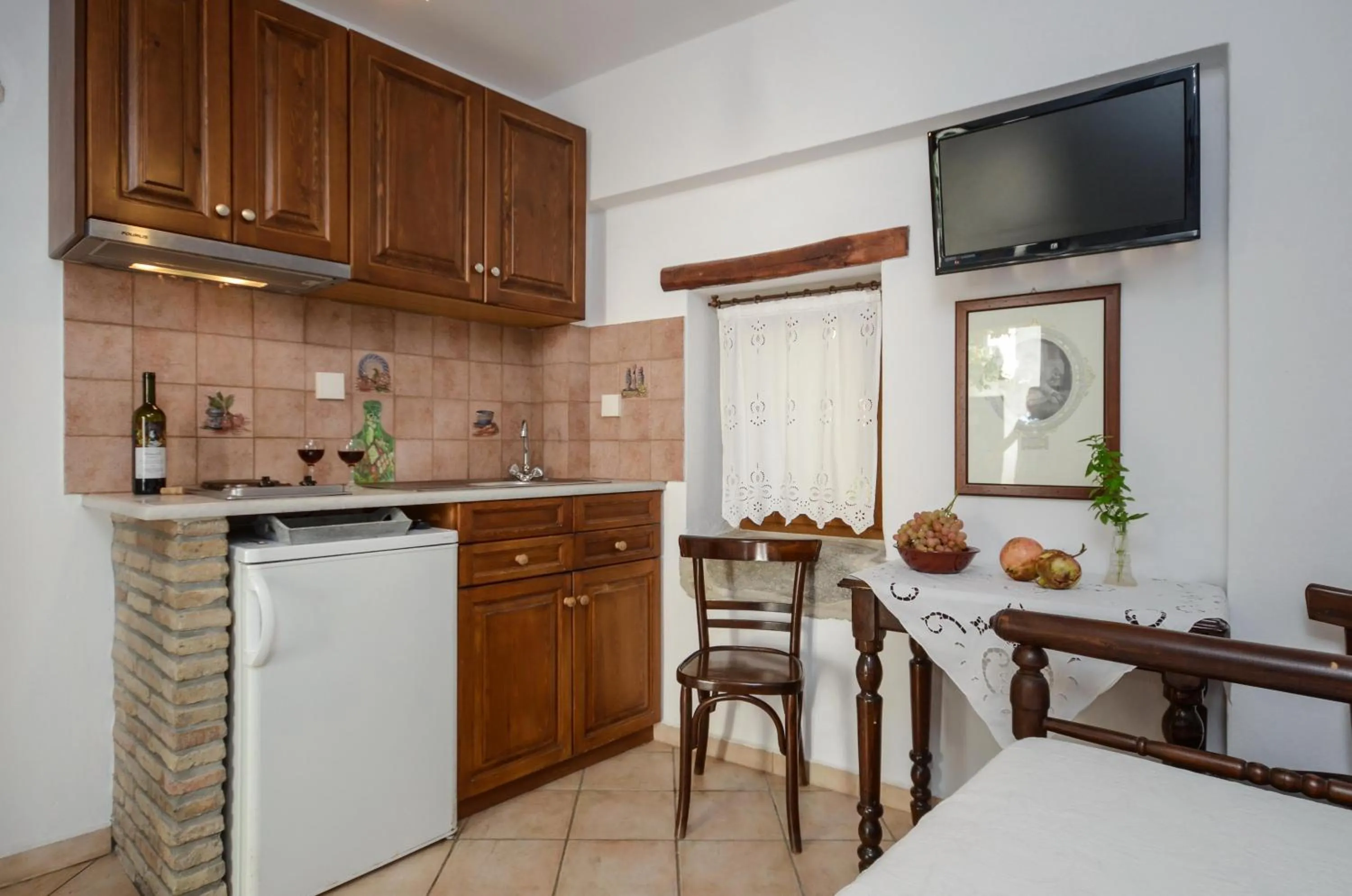 Kitchen or kitchenette in Venetiko Apartments