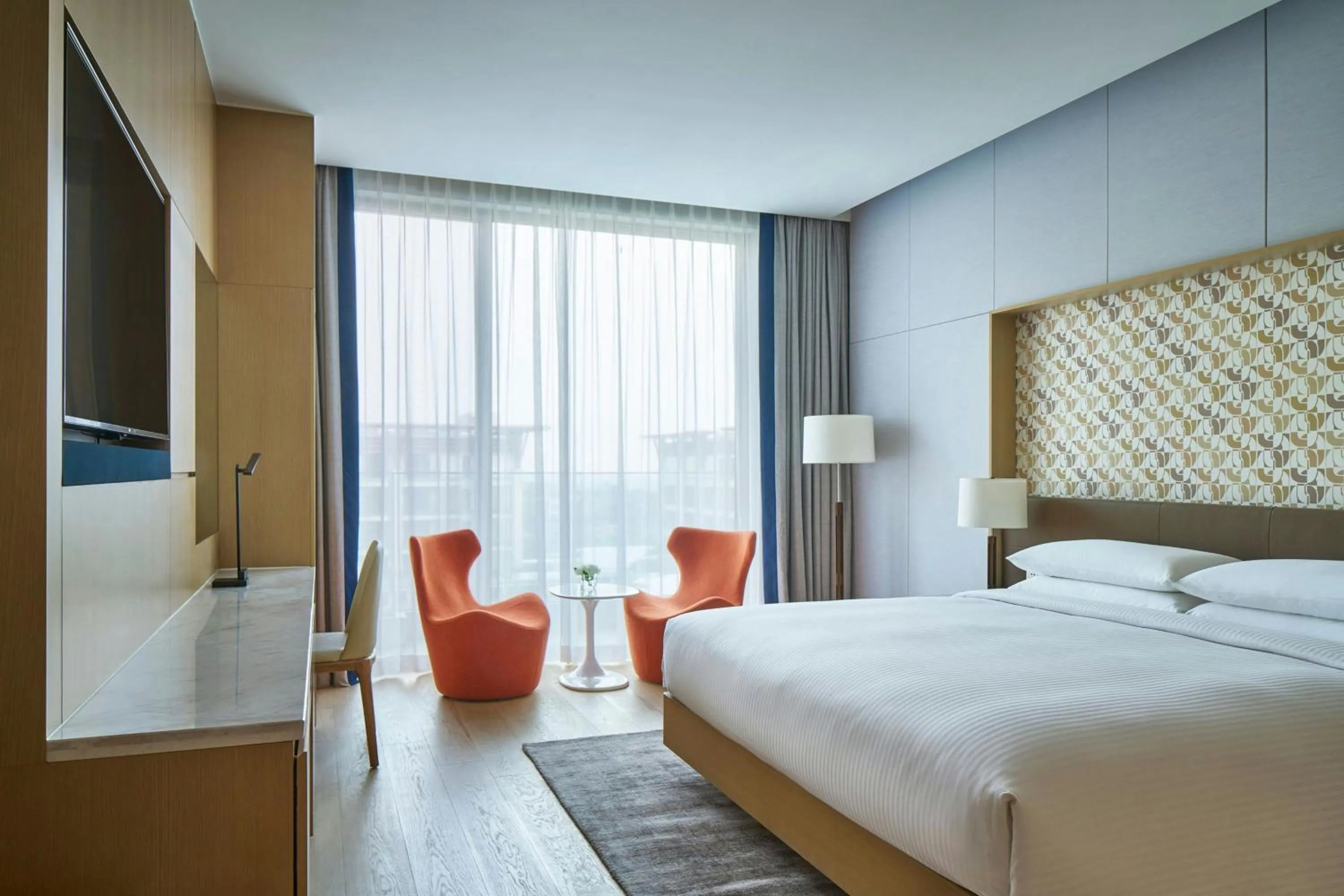 Photo of the whole room, Bed in Marriott Jeju Shinhwa World Hotel