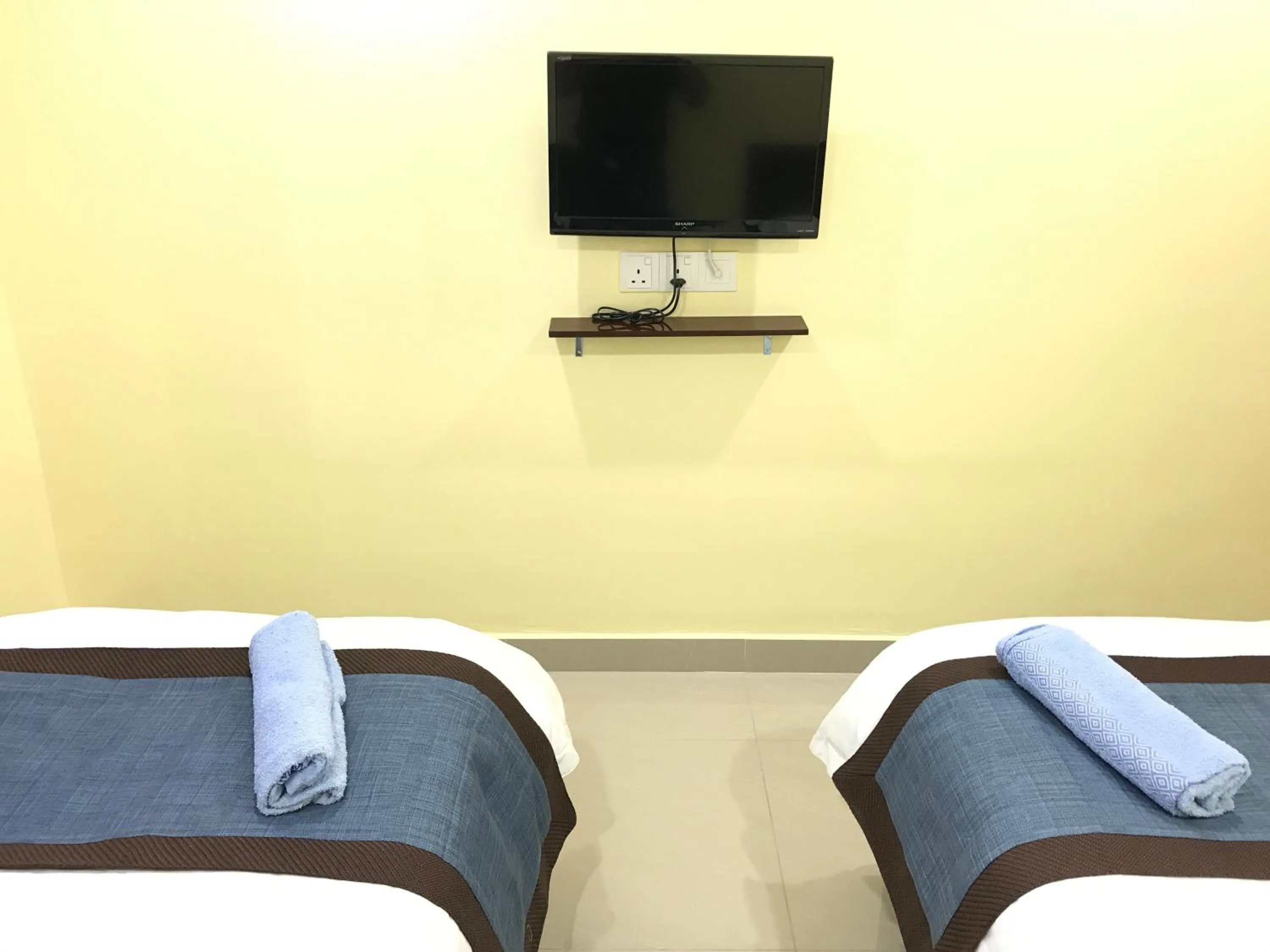 Bedroom in Maha Hotel