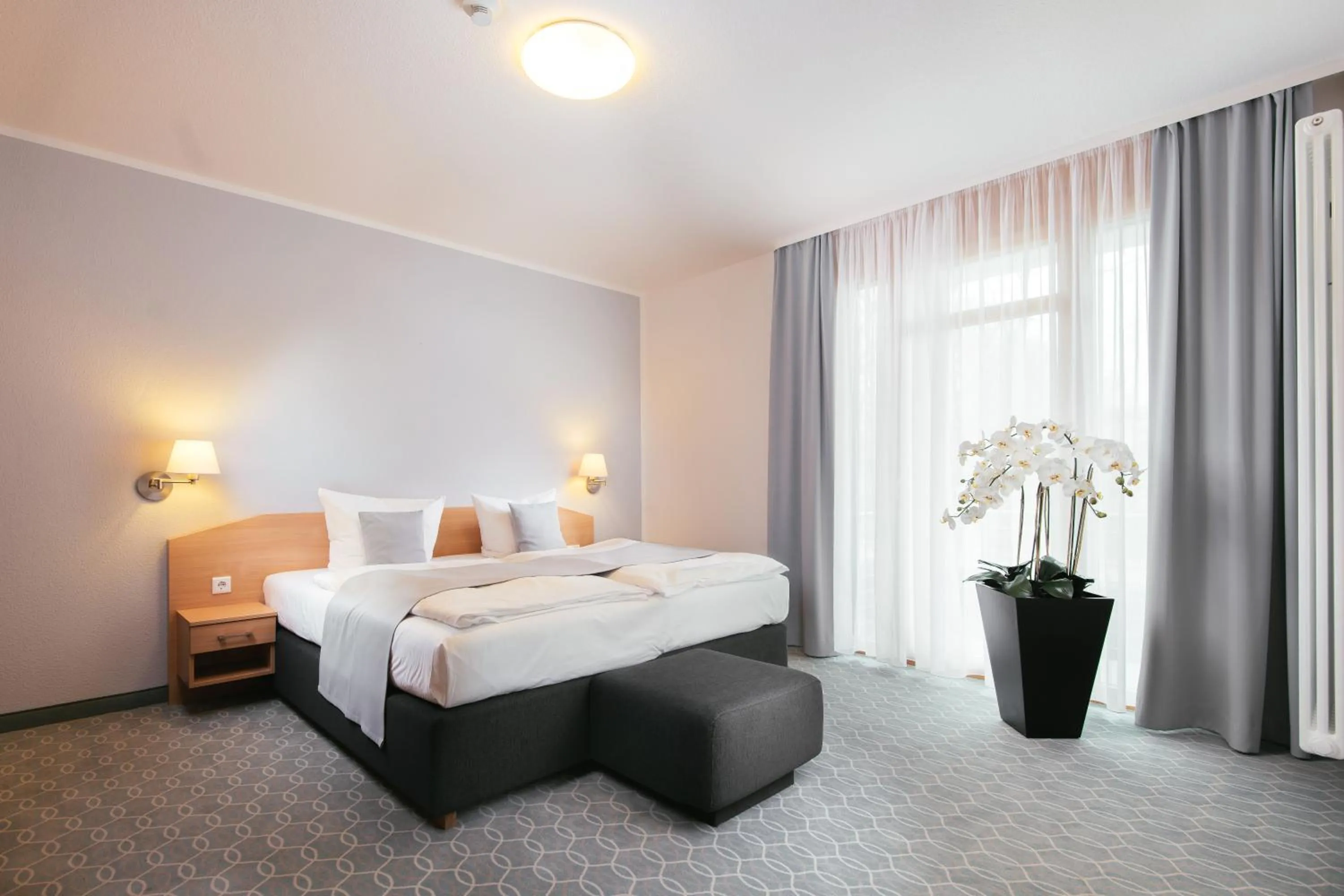 Photo of the whole room, Bed in Parkhotel IV Jahreszeiten Kühlungsborn