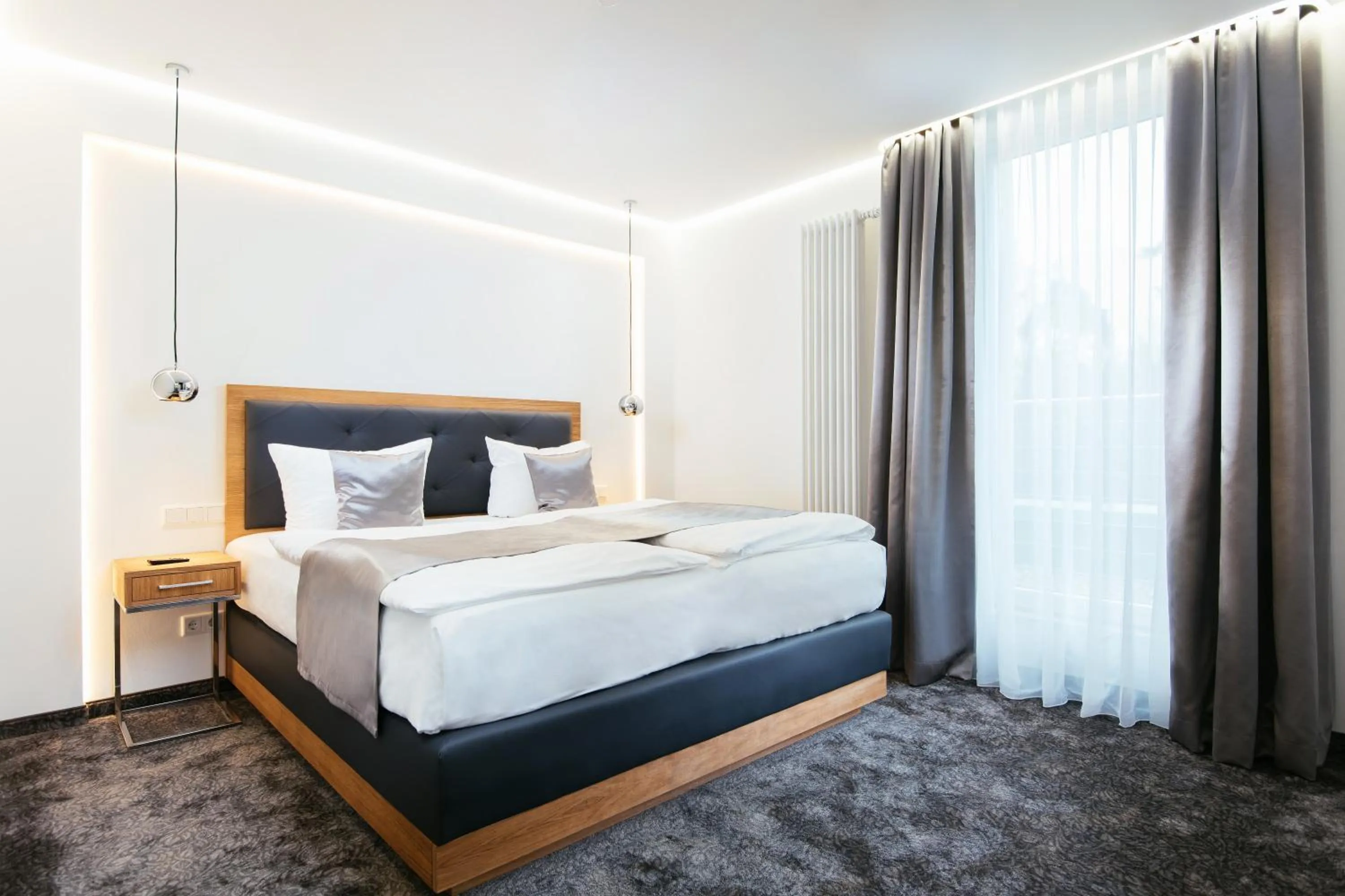 Bed in Parkhotel IV Jahreszeiten Kühlungsborn