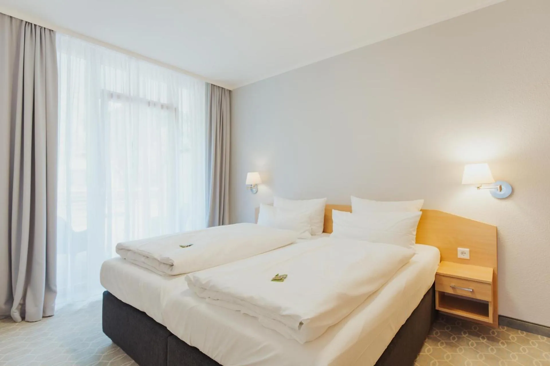 Bed in Parkhotel IV Jahreszeiten Kühlungsborn