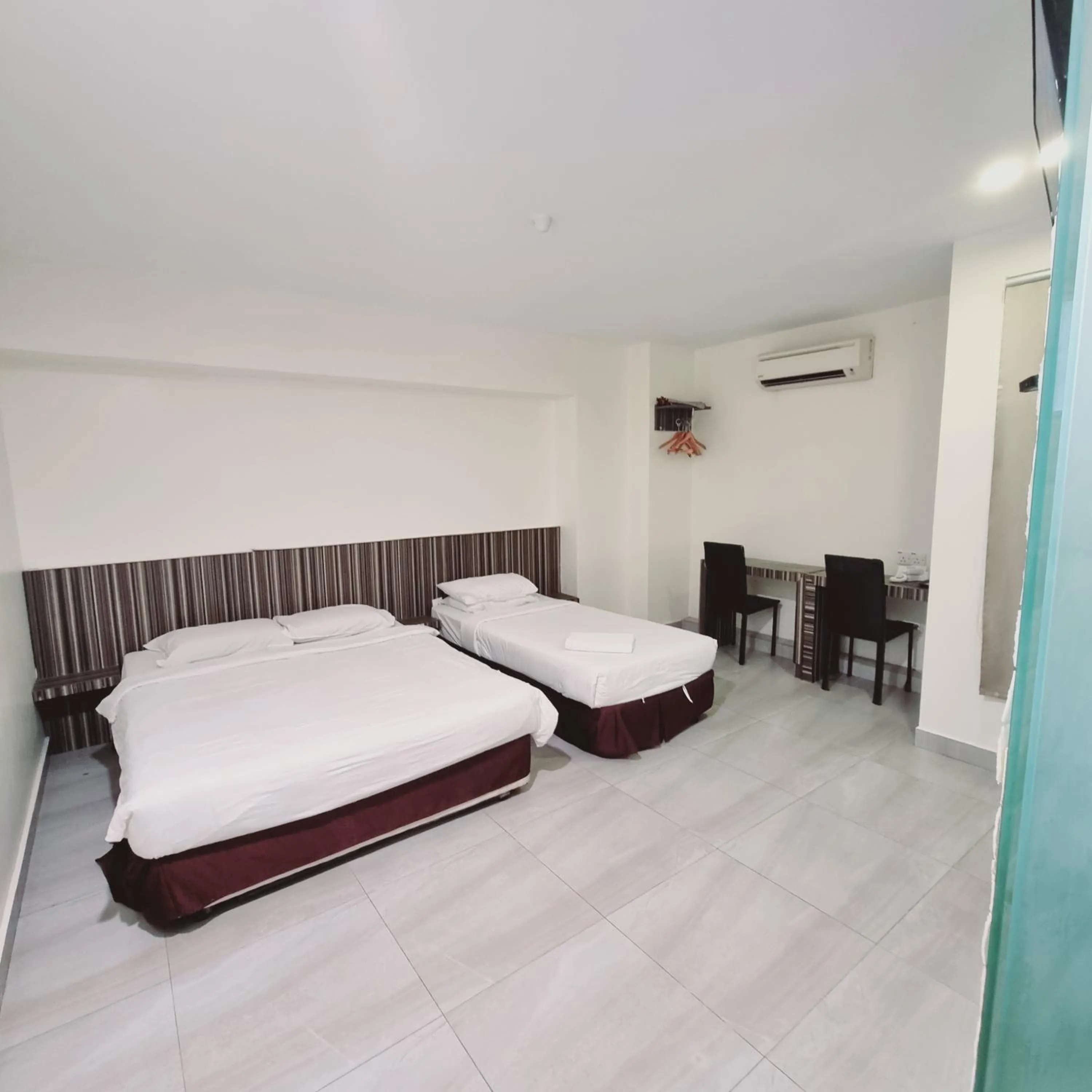 Bed in Sunrise Golden Hotel