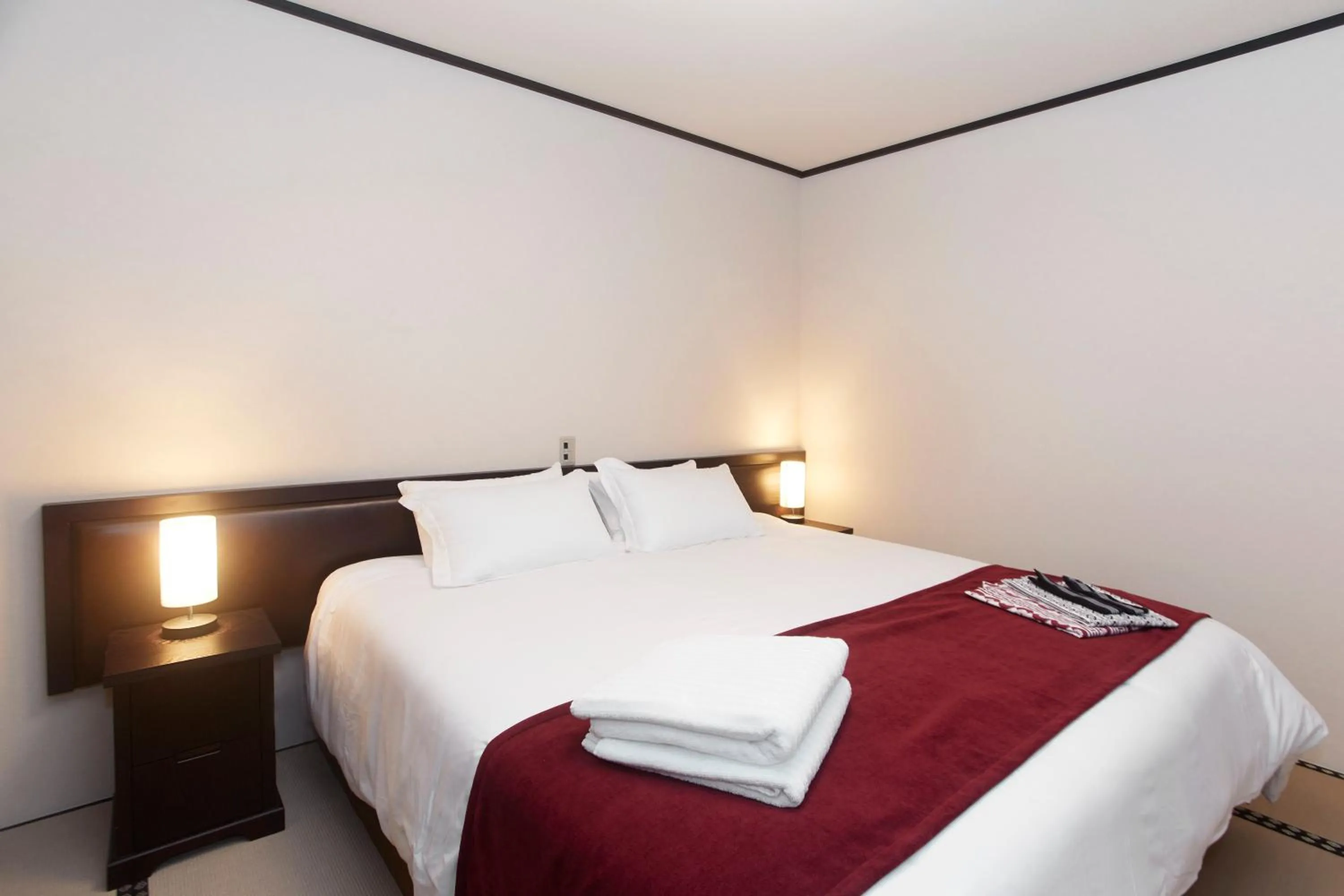 Bed in The Address Akakura