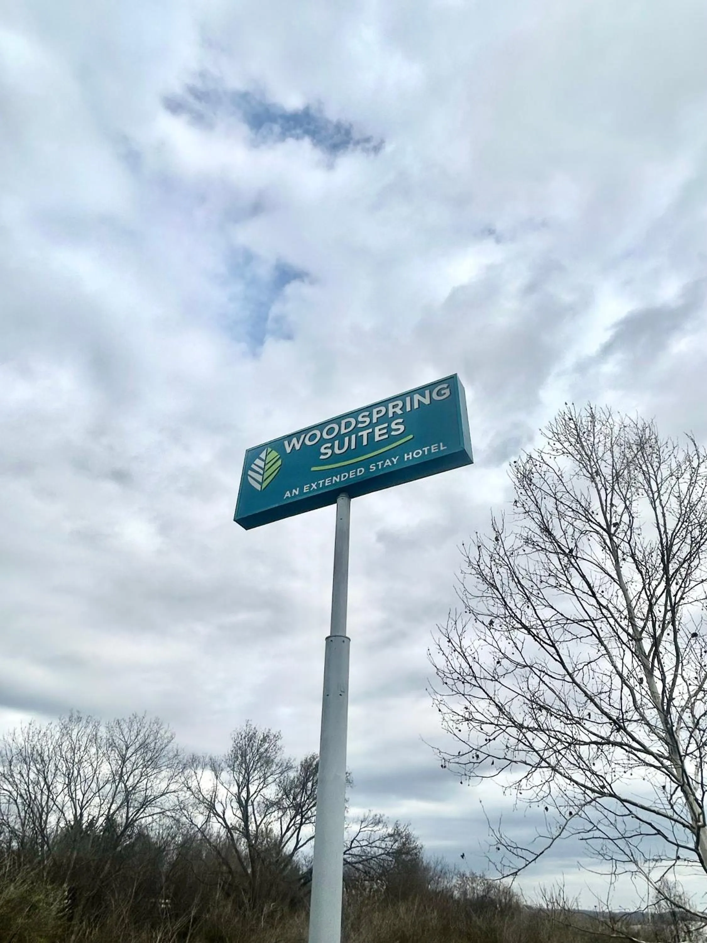 Logo/Certificate/Sign in WoodSpring Suites Nashville near Rivergate