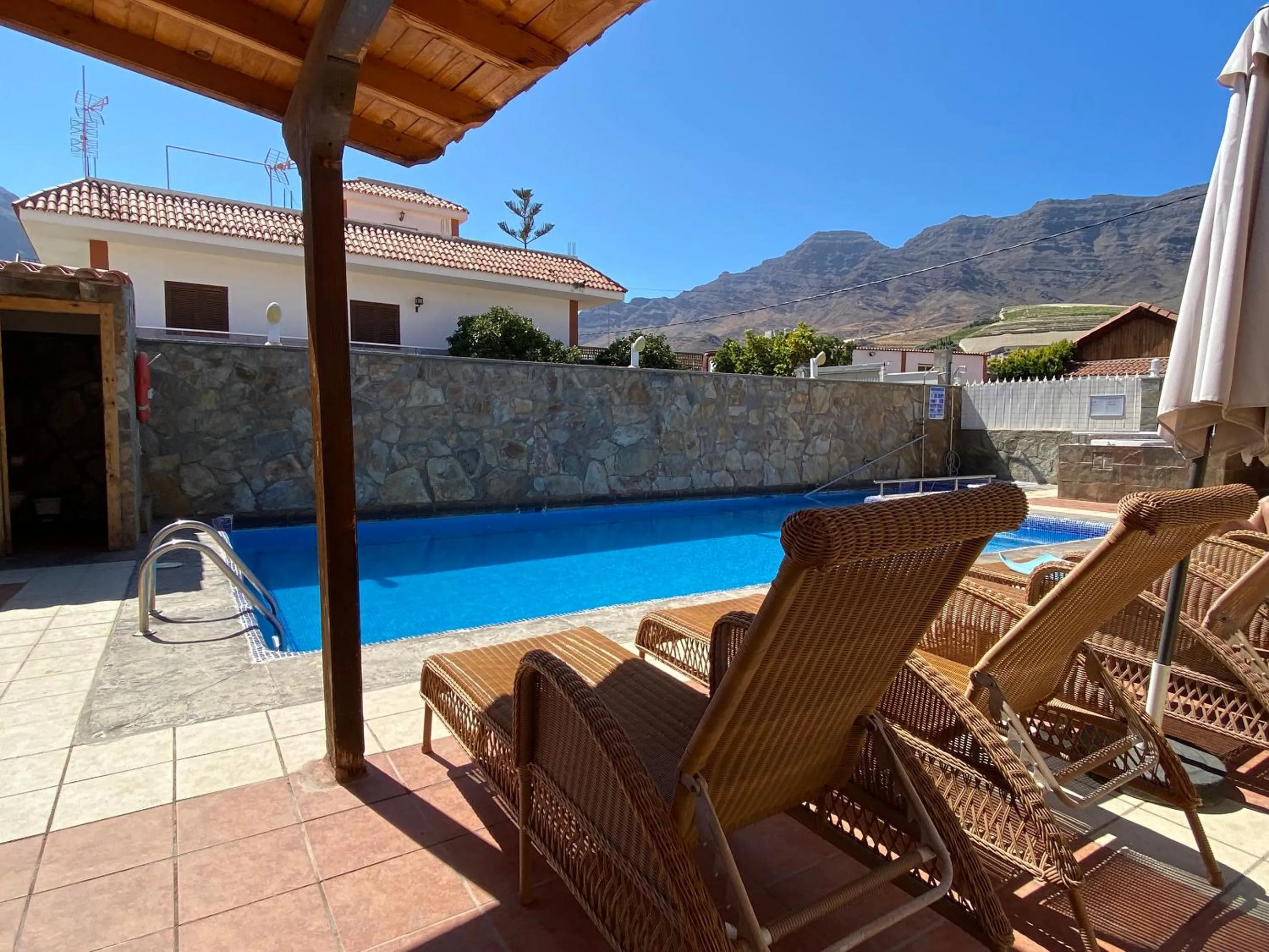 Swimming pool in Hotel La Aldea Suites