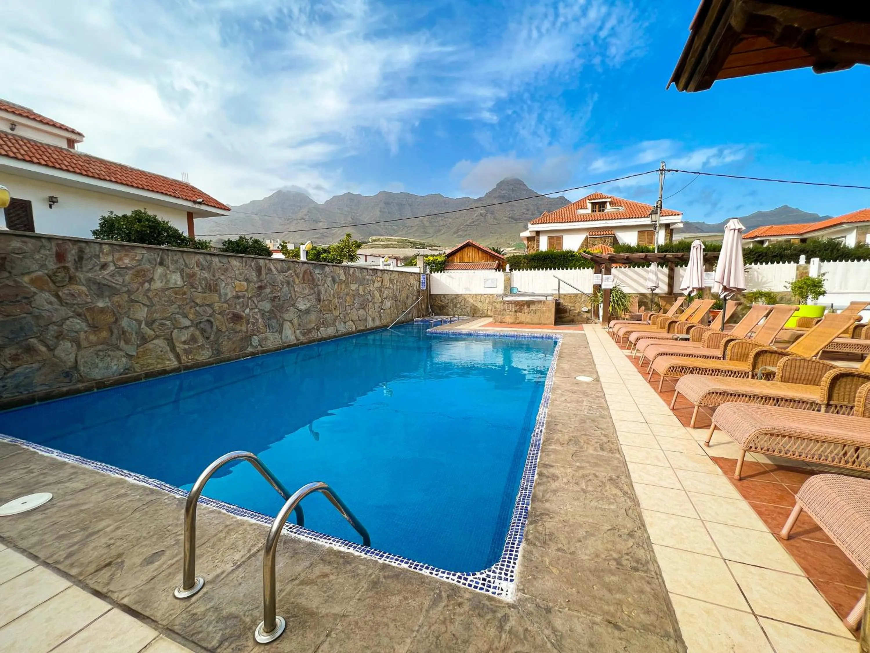 Swimming pool in Hotel La Aldea Suites