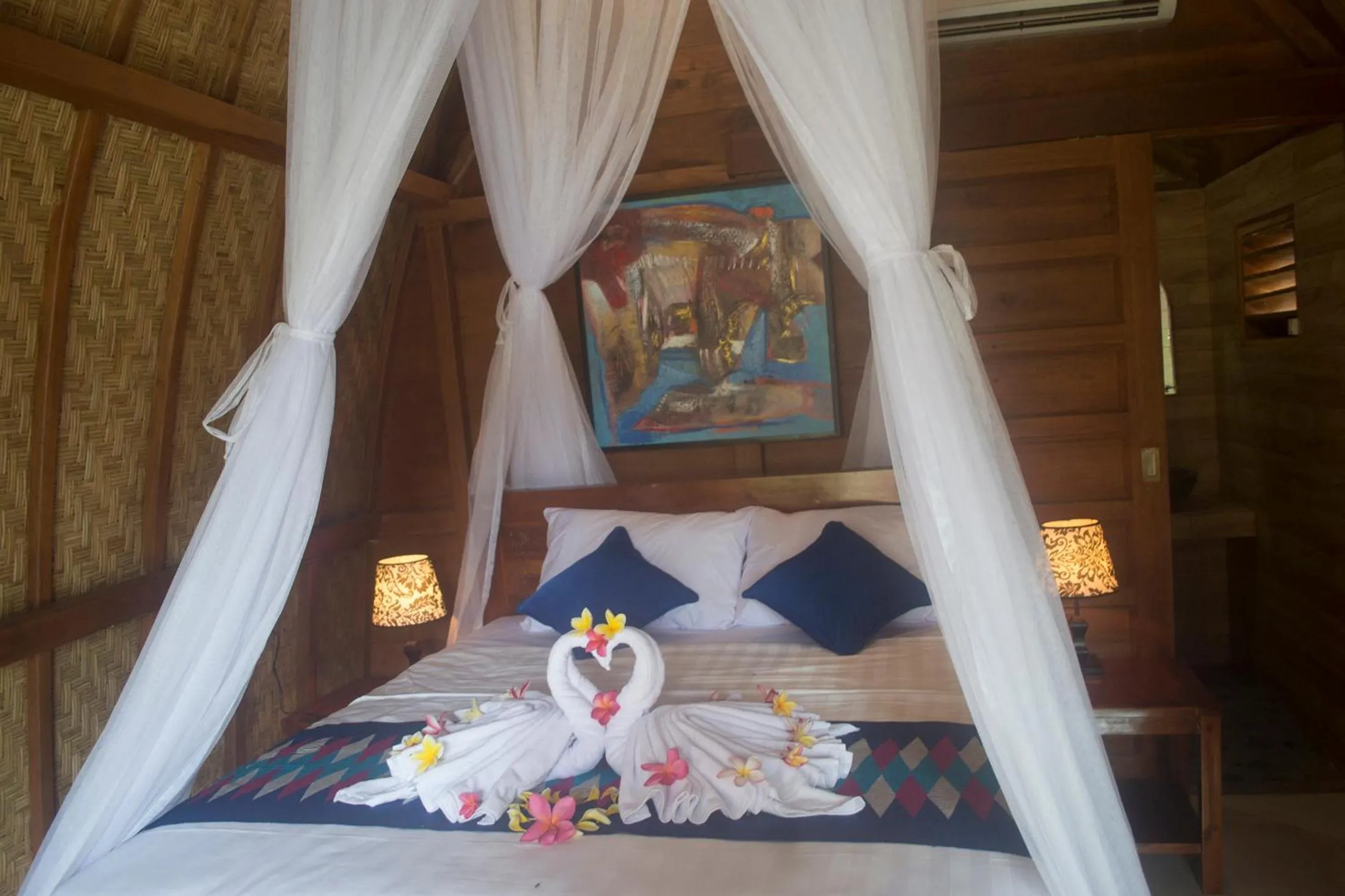 Bed in The Sandat Bungalow