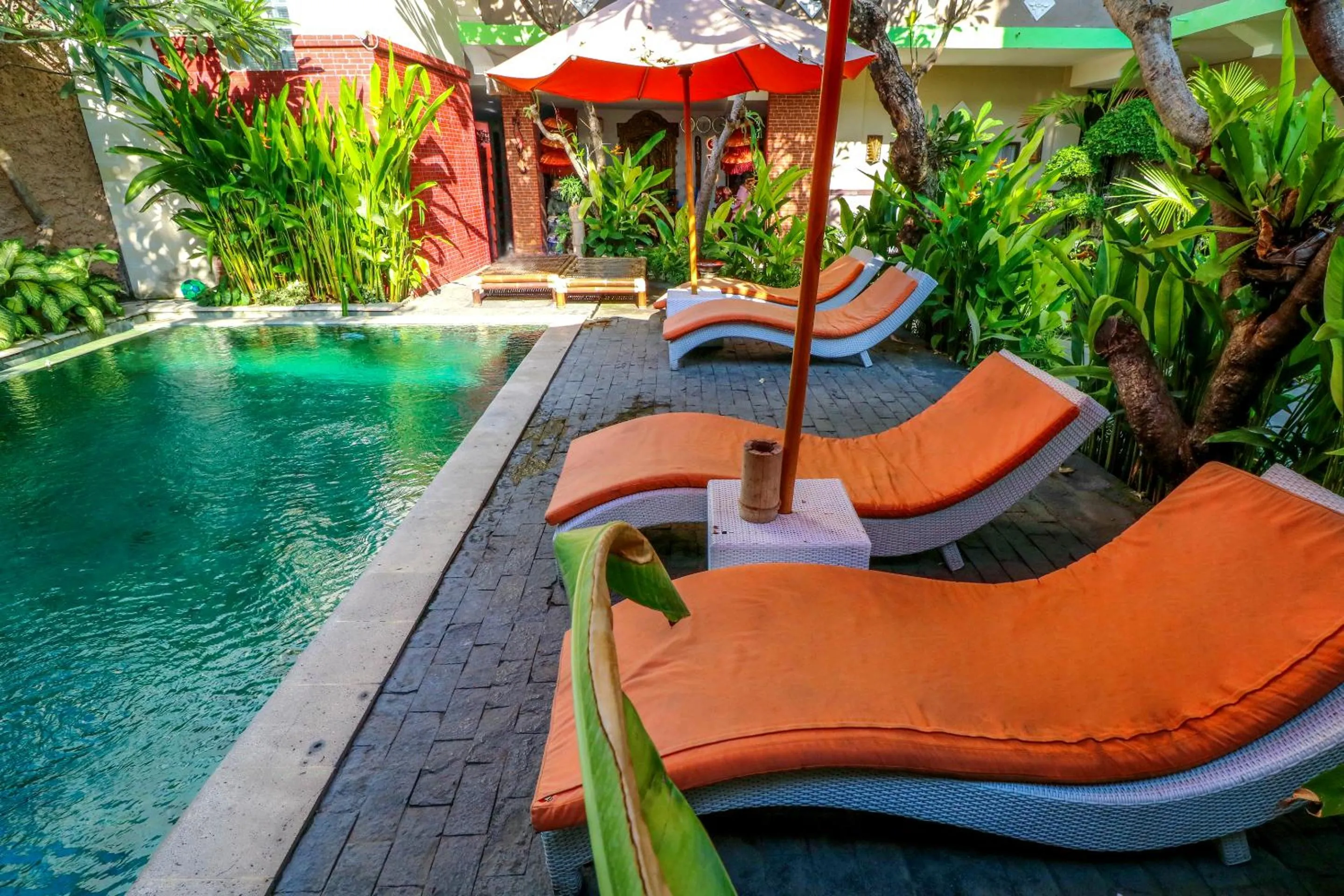 Swimming pool in Capital O 1666 Grand Pudjawan Hotel Near Kuta Beach