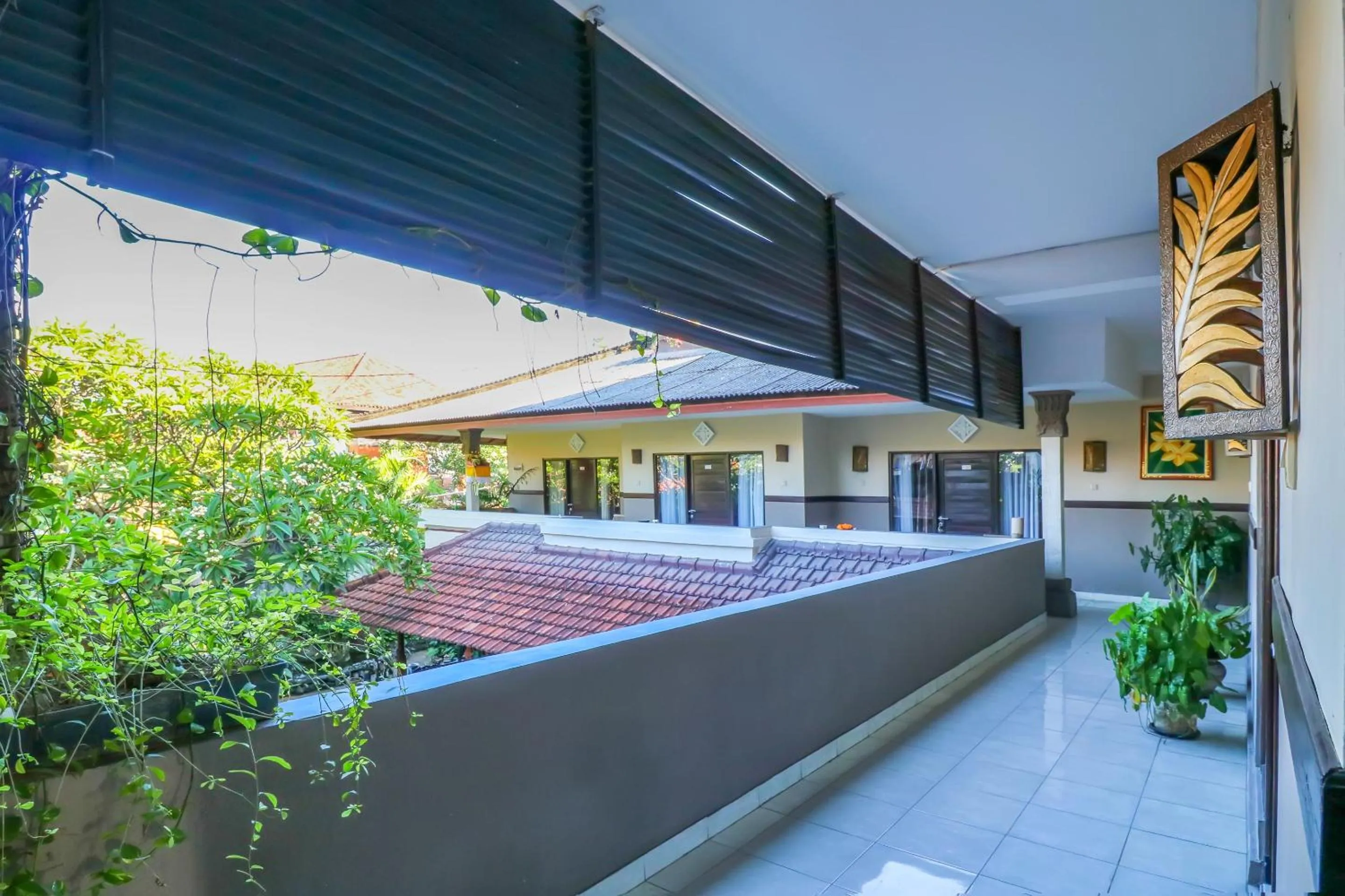 Balcony/Terrace in Capital O 1666 Grand Pudjawan Hotel Near Kuta Beach