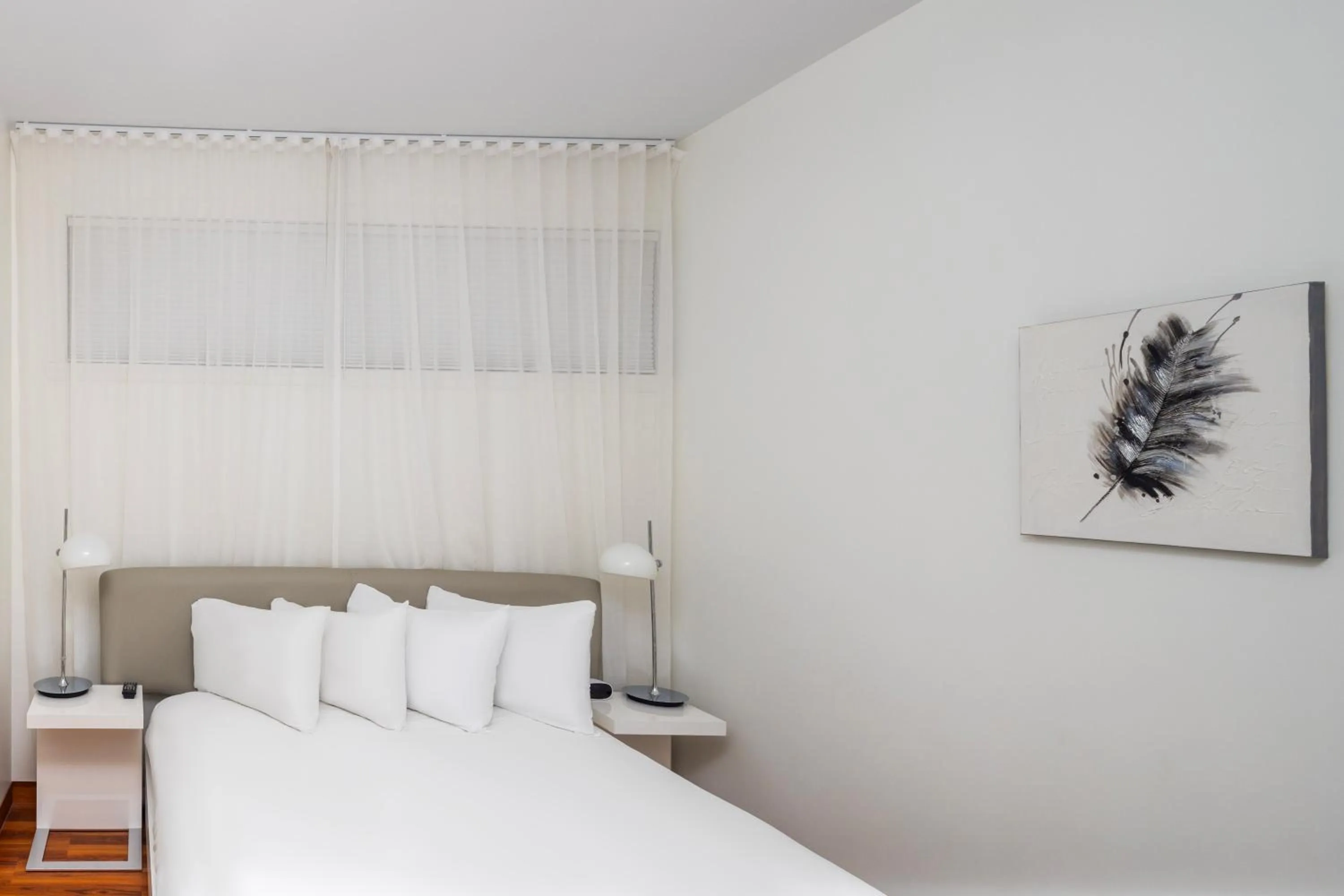 Bed in Les Suites de Laviolette, an Ascend Collection Hotel