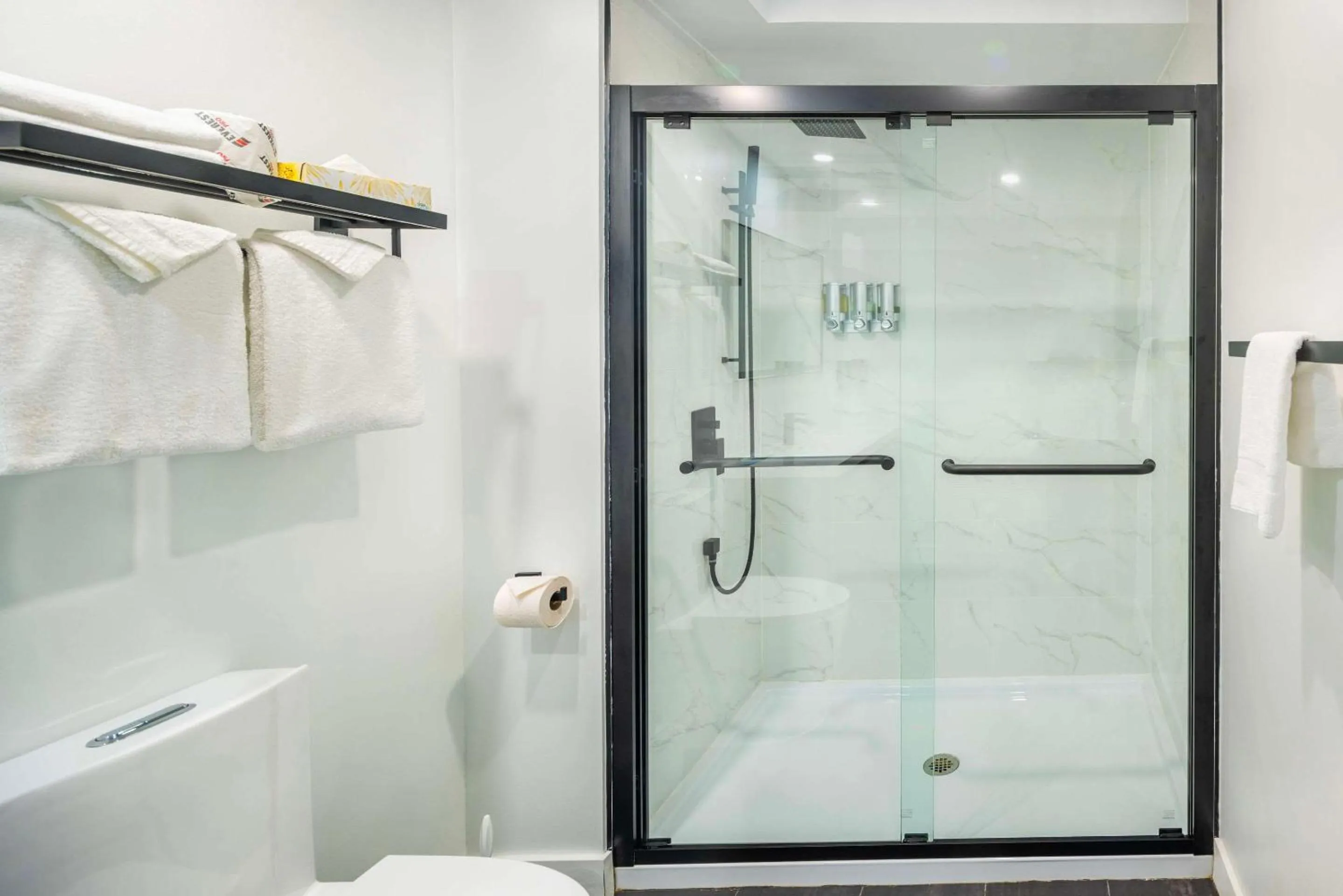 Bedroom in Les Suites de Laviolette, an Ascend Collection Hotel