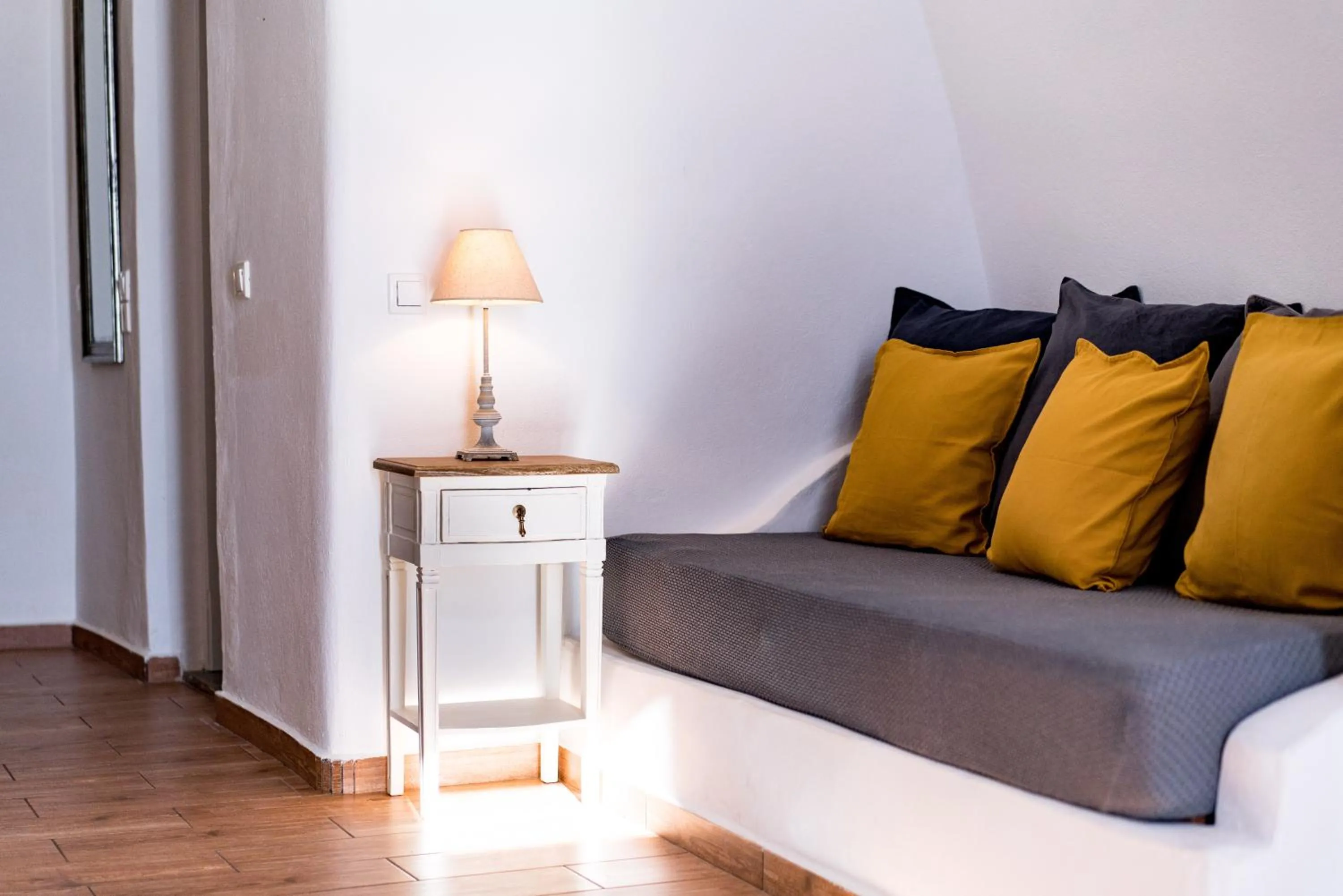 Seating area, Bed in Aspa Caves