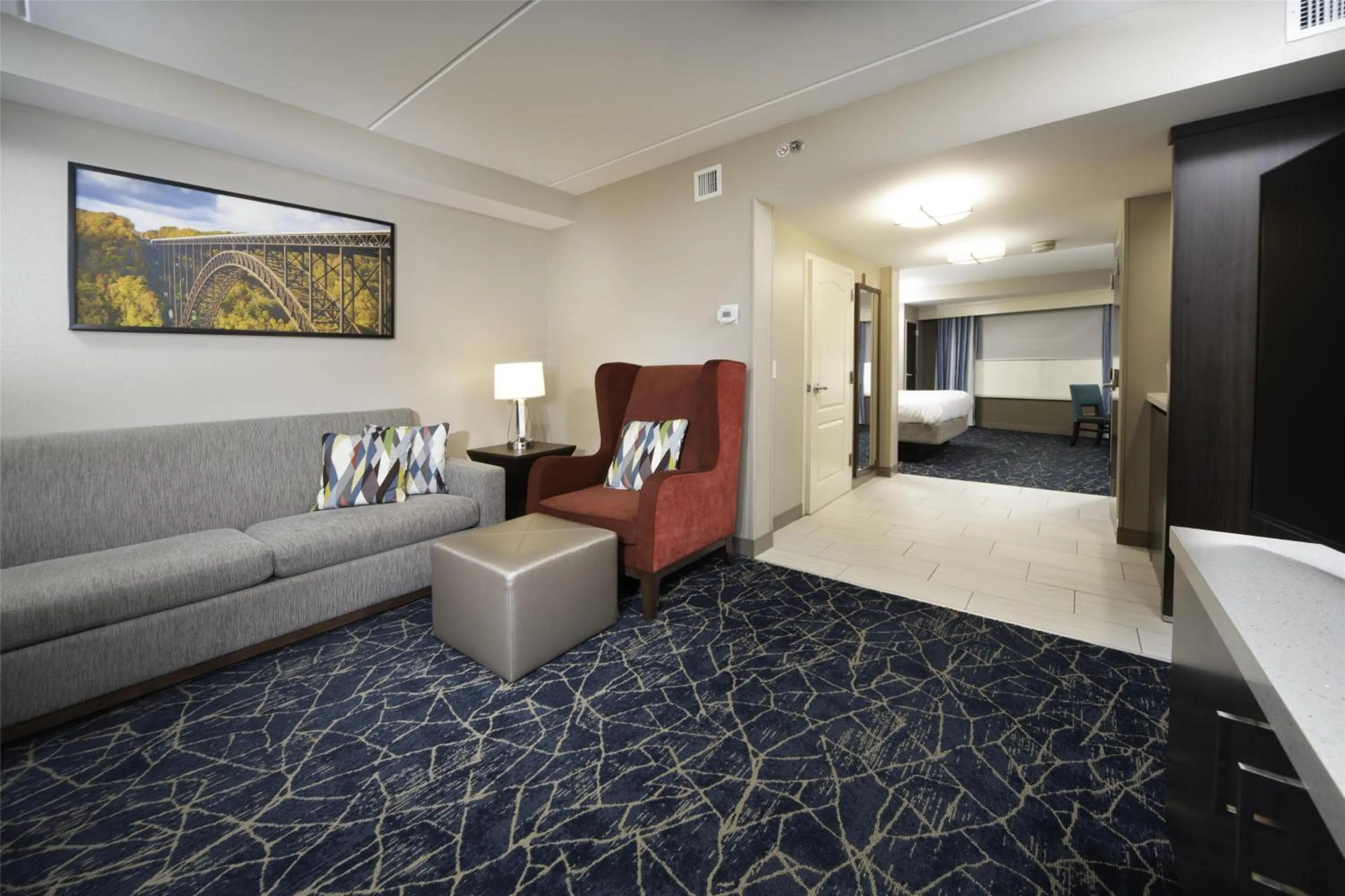 Living room, Bed in Hilton Garden Inn Fayetteville/Fort Bragg