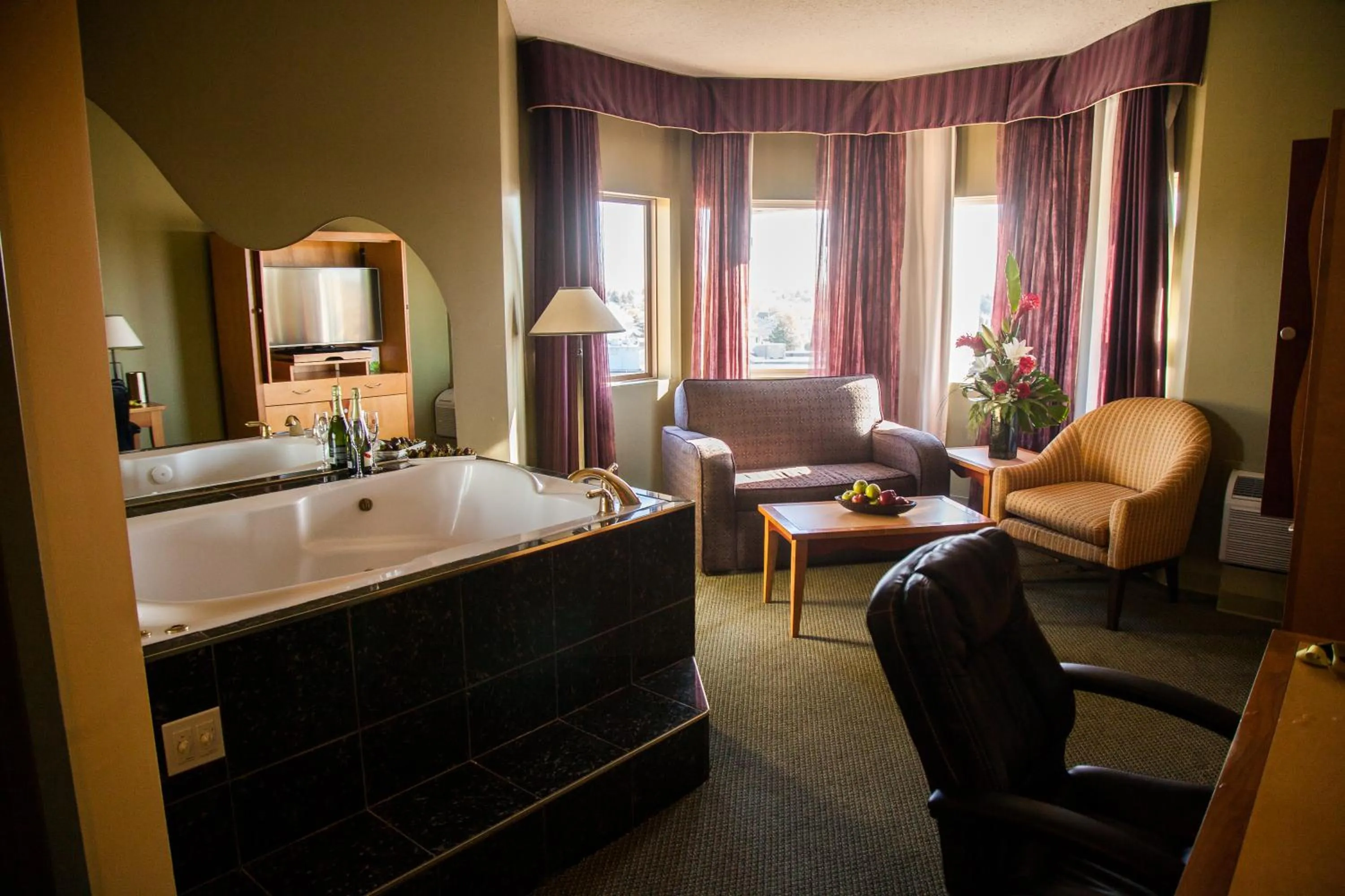 Living room in Medicine Hat Lodge, Trademark Collection by Wyndham