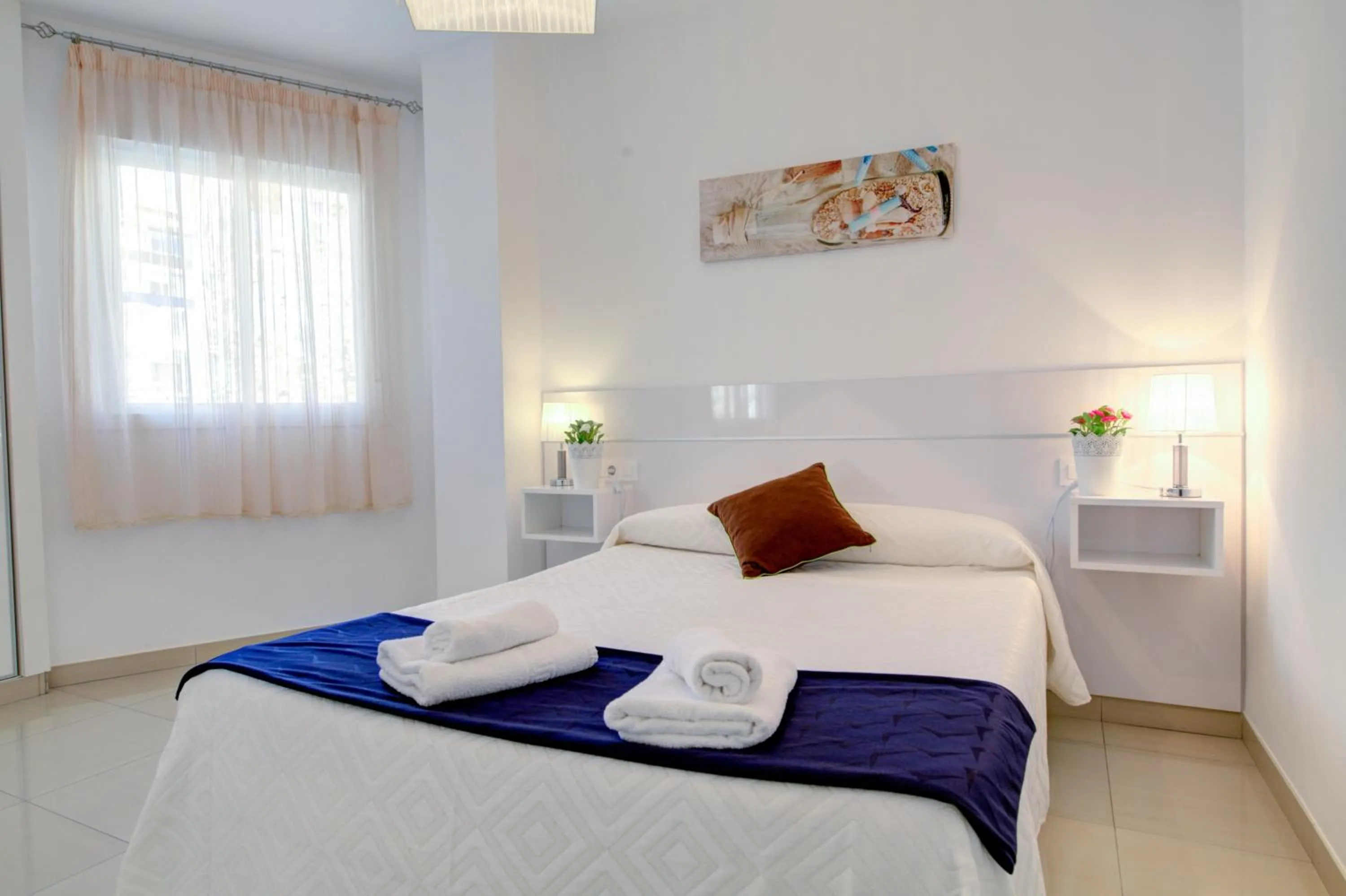 Bed in Apartamento Las Palmeras