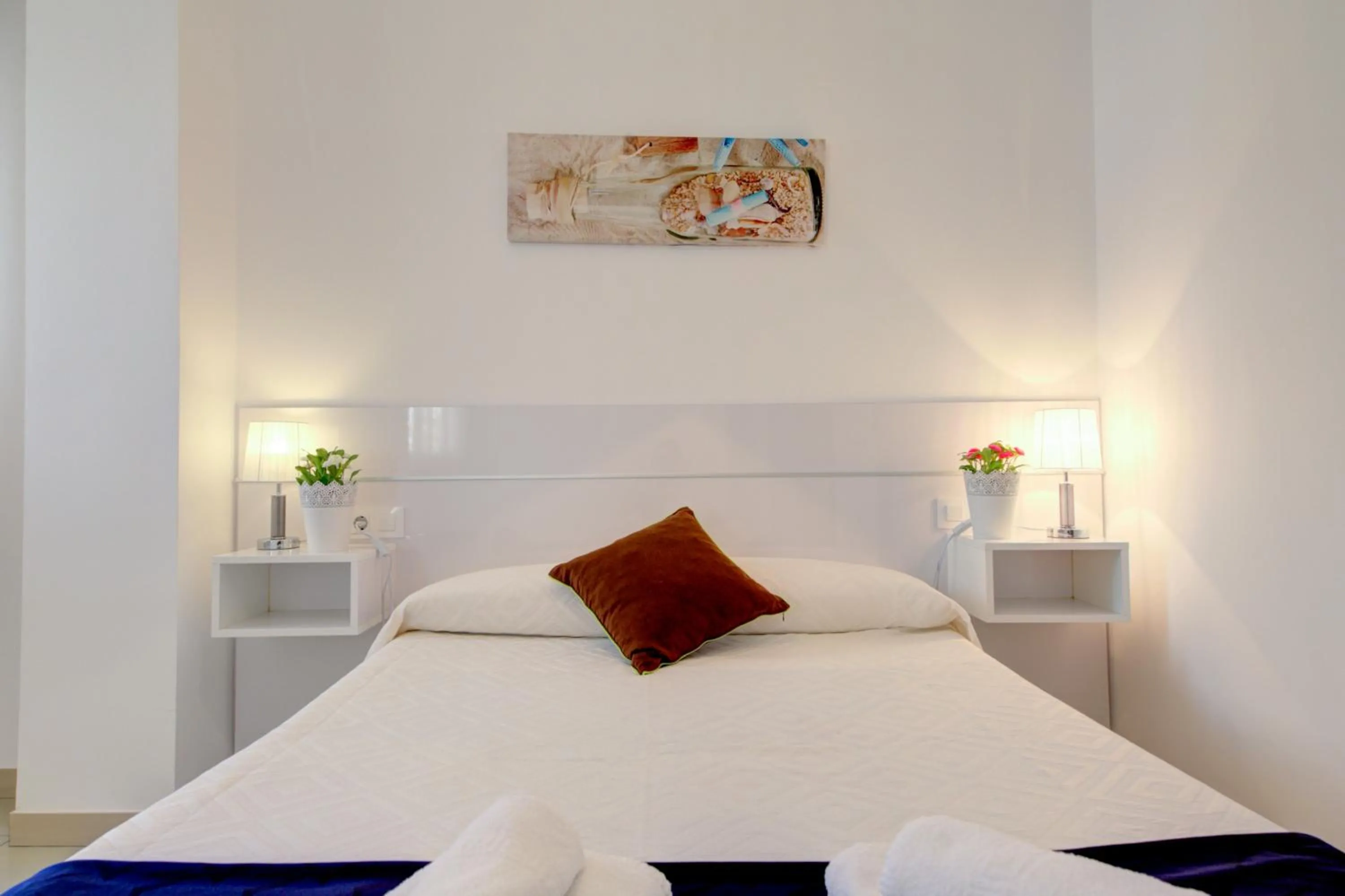 Bed in Apartamento Las Palmeras