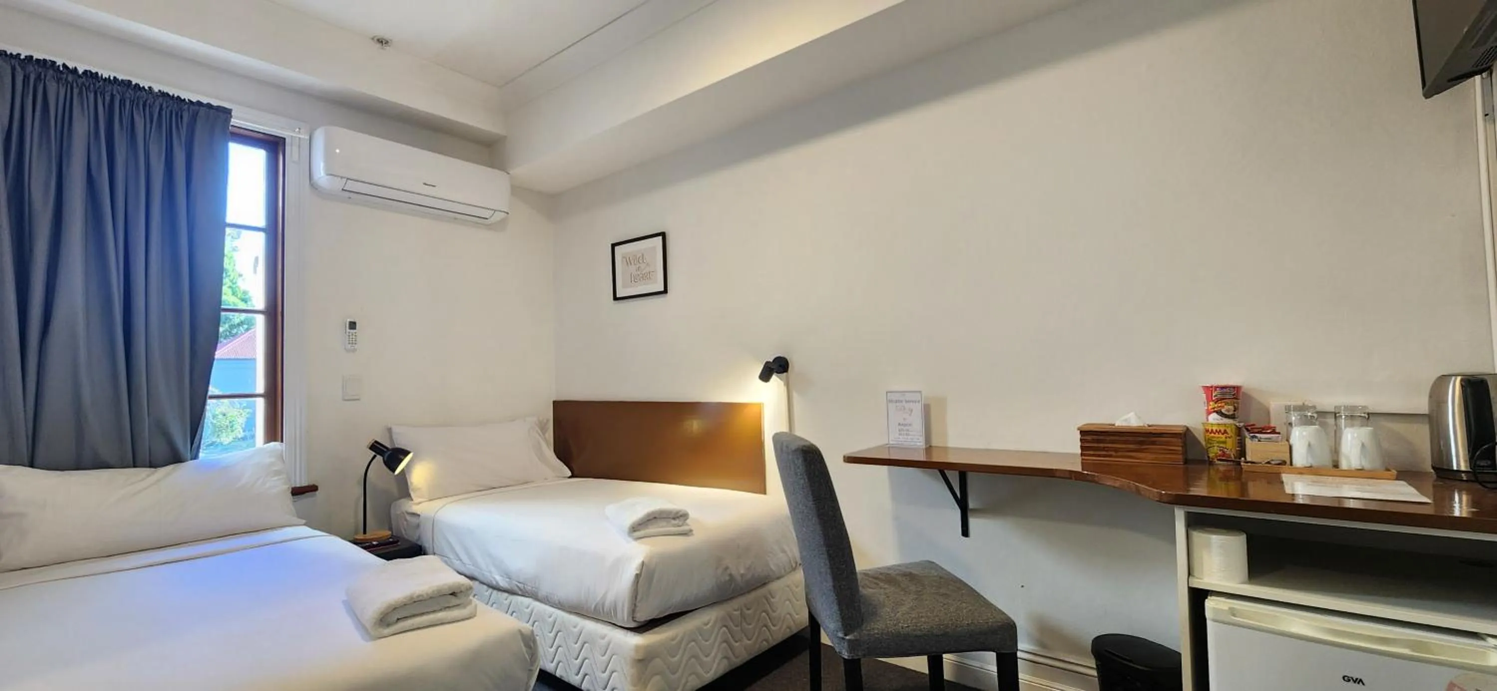 Bed in Newtown Cozy Stays