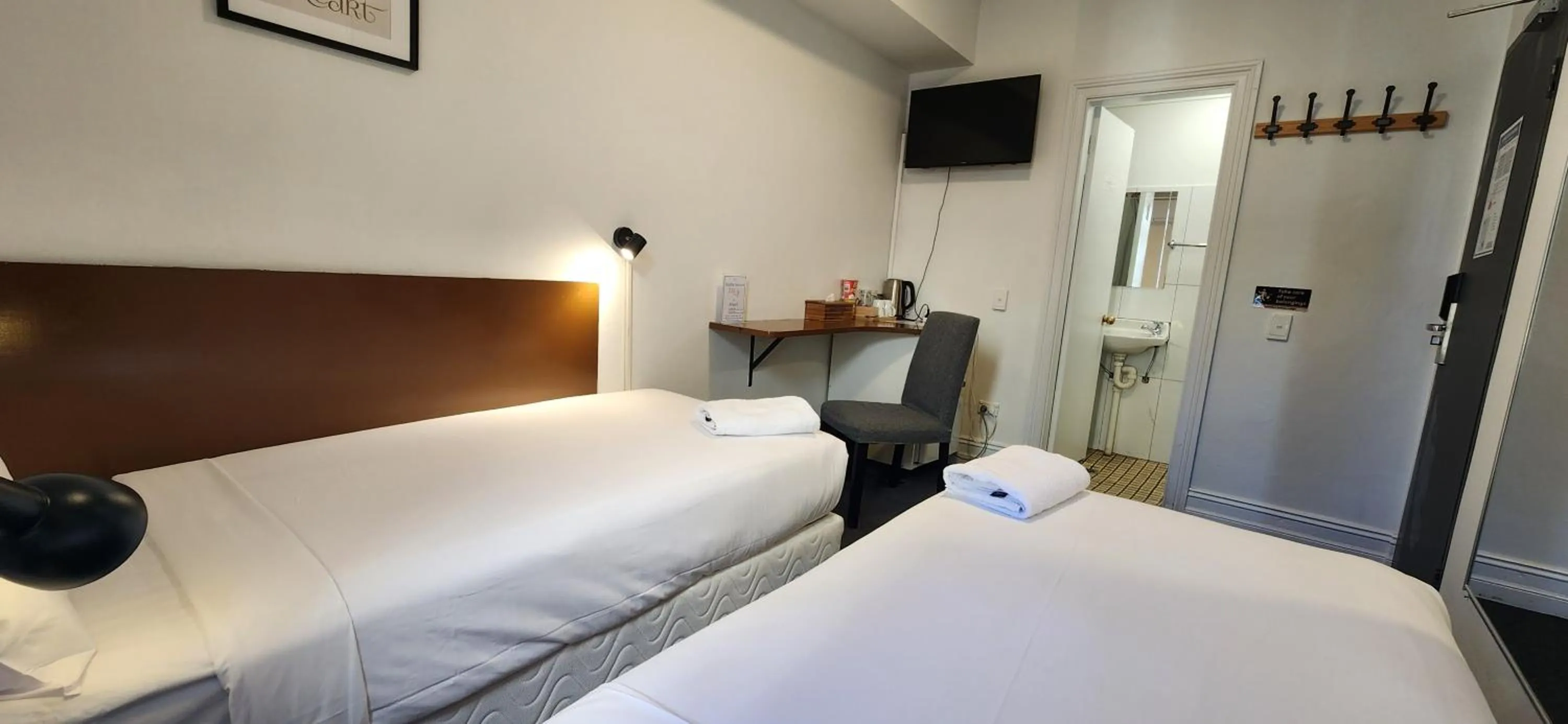 Photo of the whole room, Bed in Newtown Cozy Stays