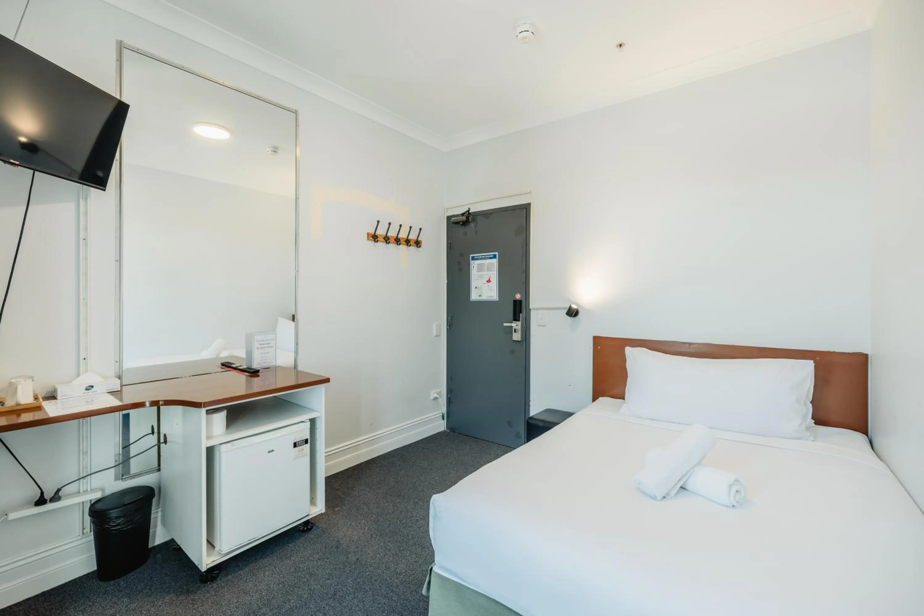 Bed in Newtown Cozy Stays