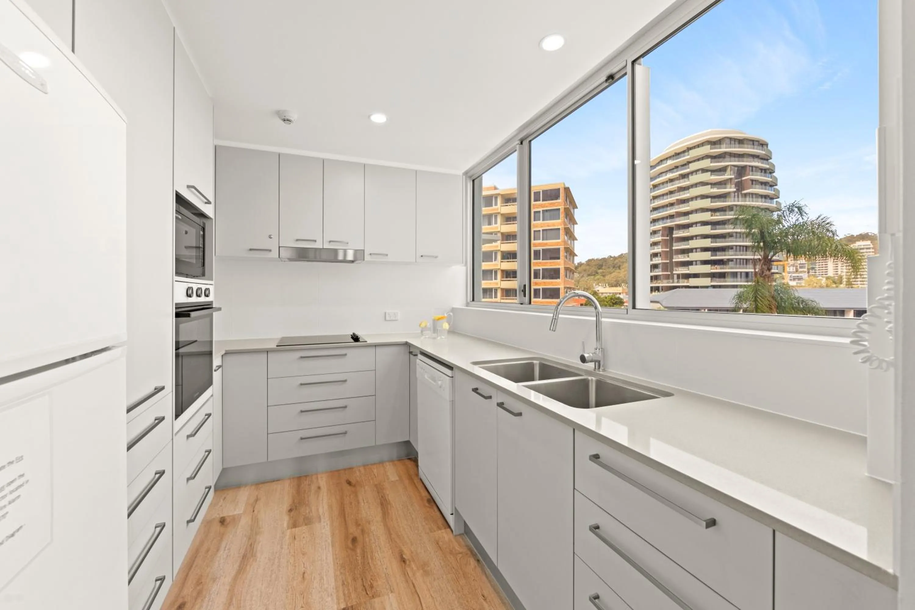 kitchen in Pacific Regis Beachfront Holiday Apartments