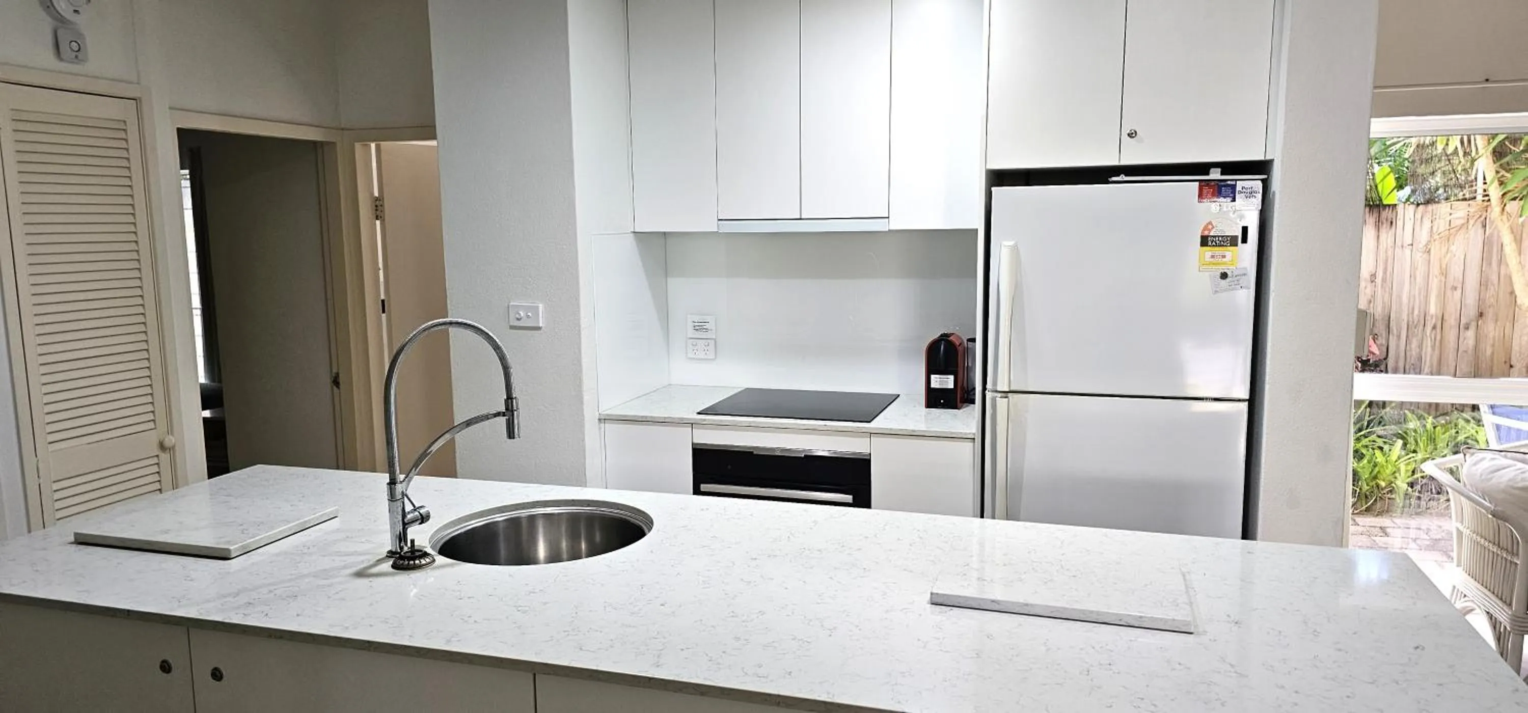 kitchen in Mango Tree Holiday Apartments
