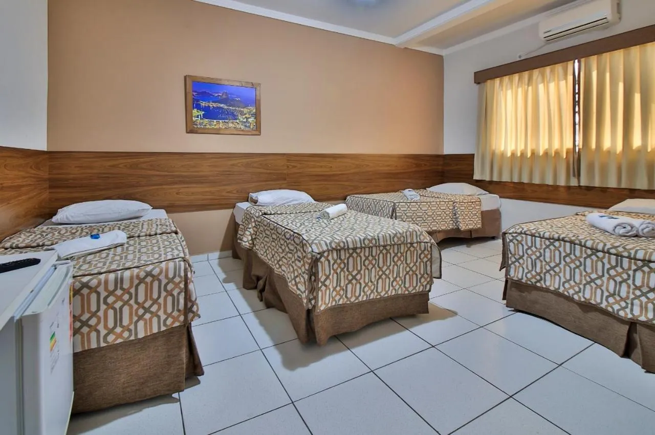 Bed in Hotel Romaria Aparecida