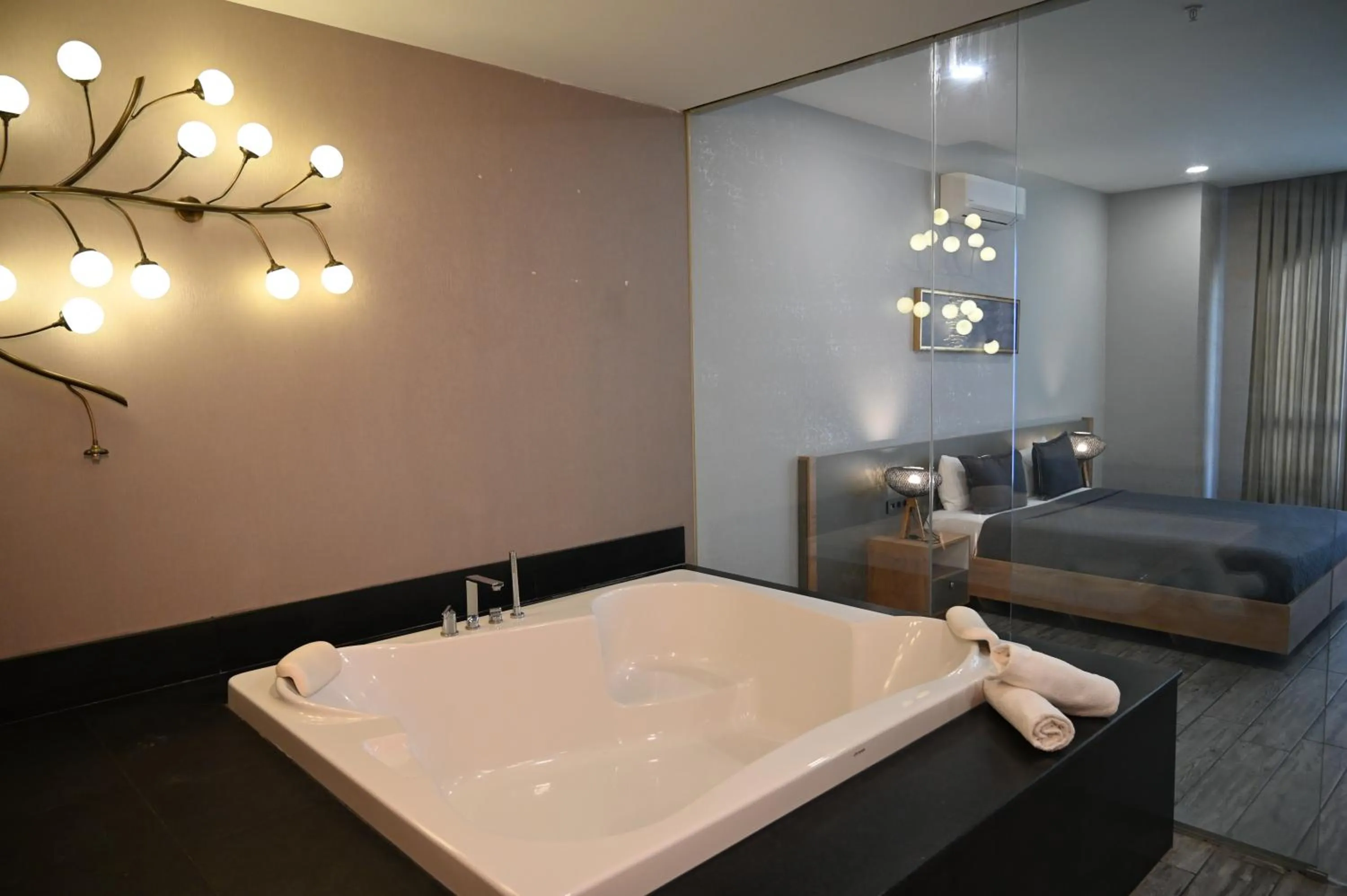 Bathroom, Bed in Agora Suites