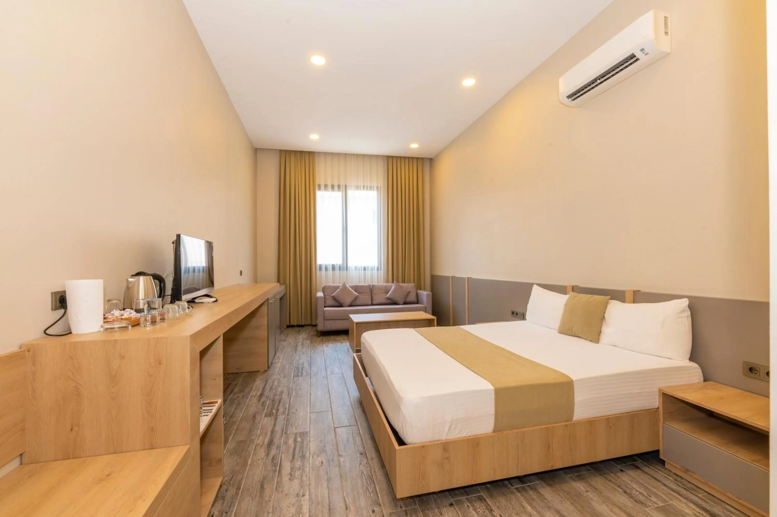 Photo of the whole room, Bed in Agora Suites