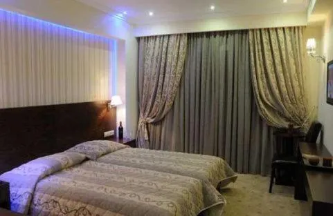 Bed in Phaidon Hotel & Spa