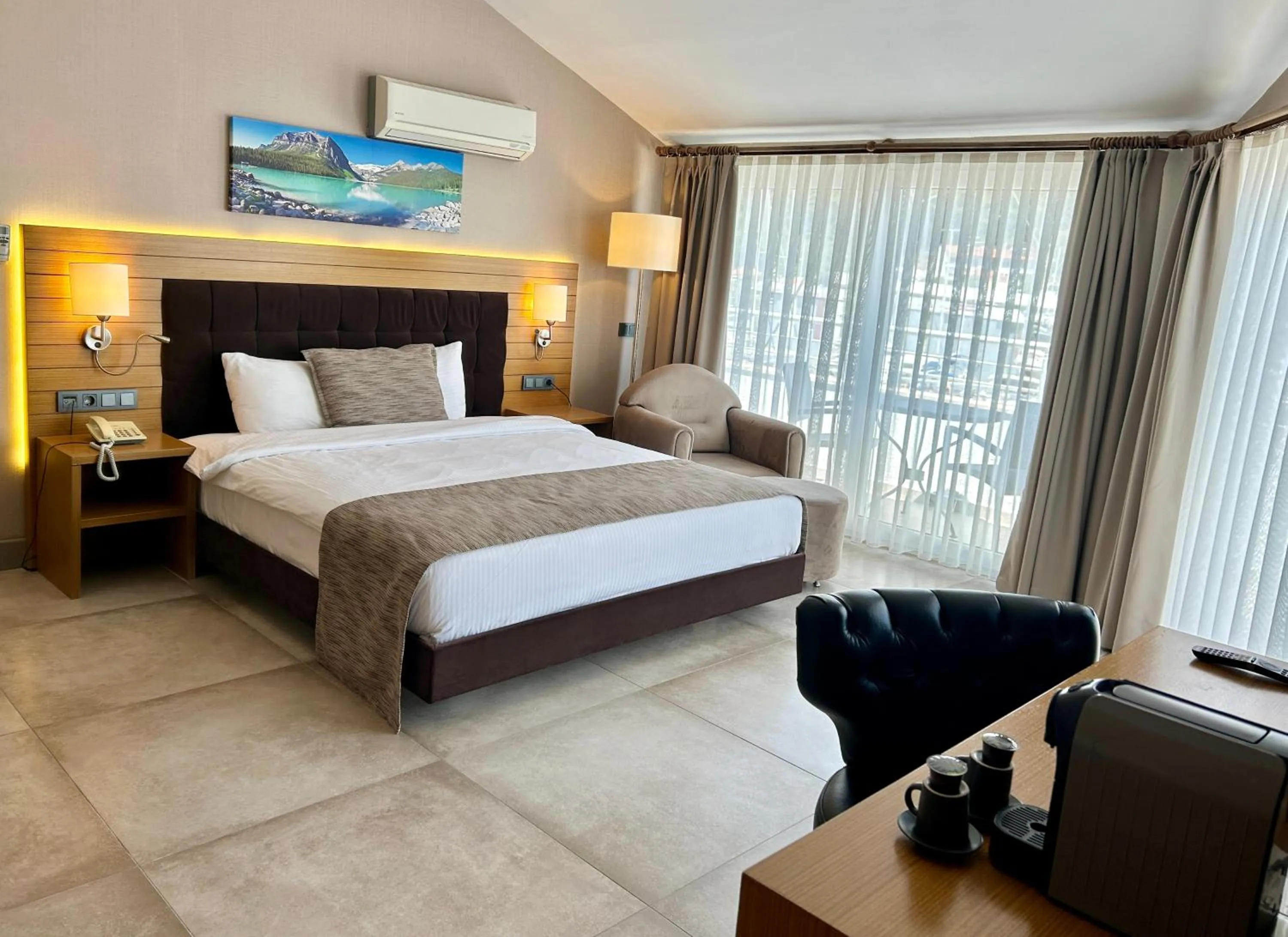 Bed in Marina Boutique Hotel