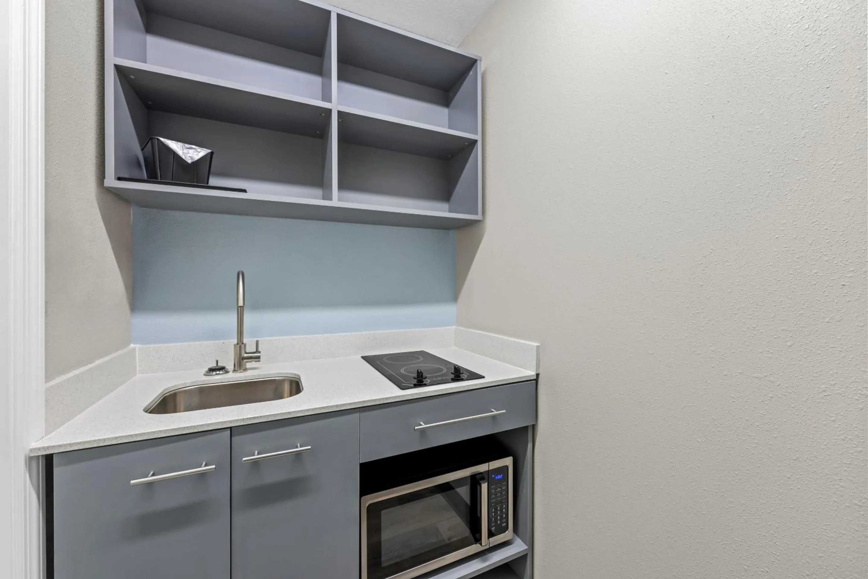 Photo of the whole room in HomeTowne Studios by Red Roof Athens, TN