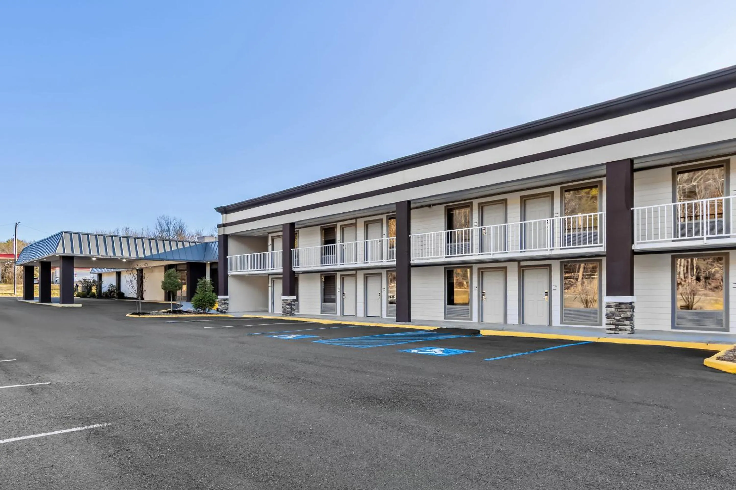 Property building in HomeTowne Studios by Red Roof Athens, TN