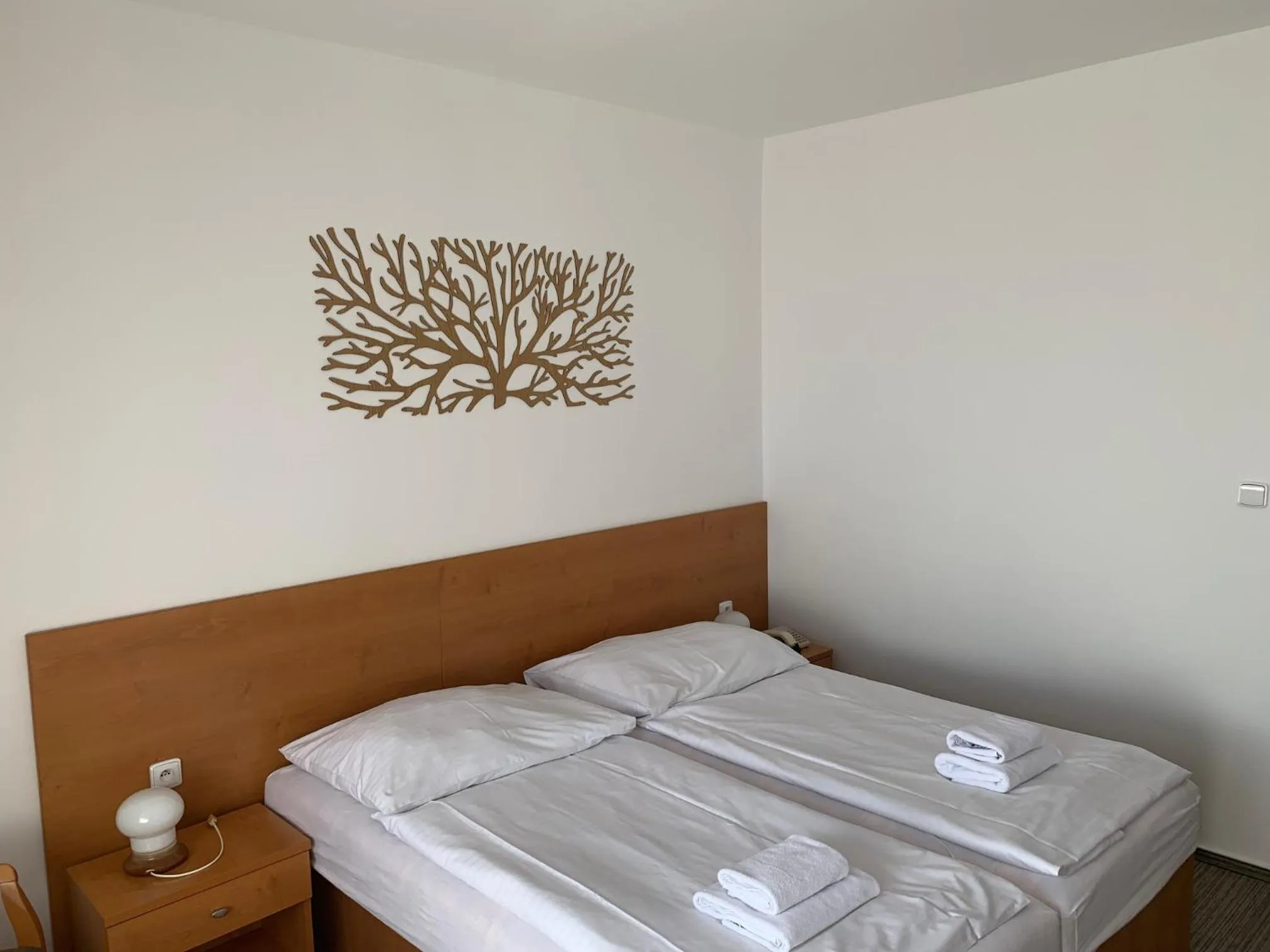 Bed in Hotel Adamantino