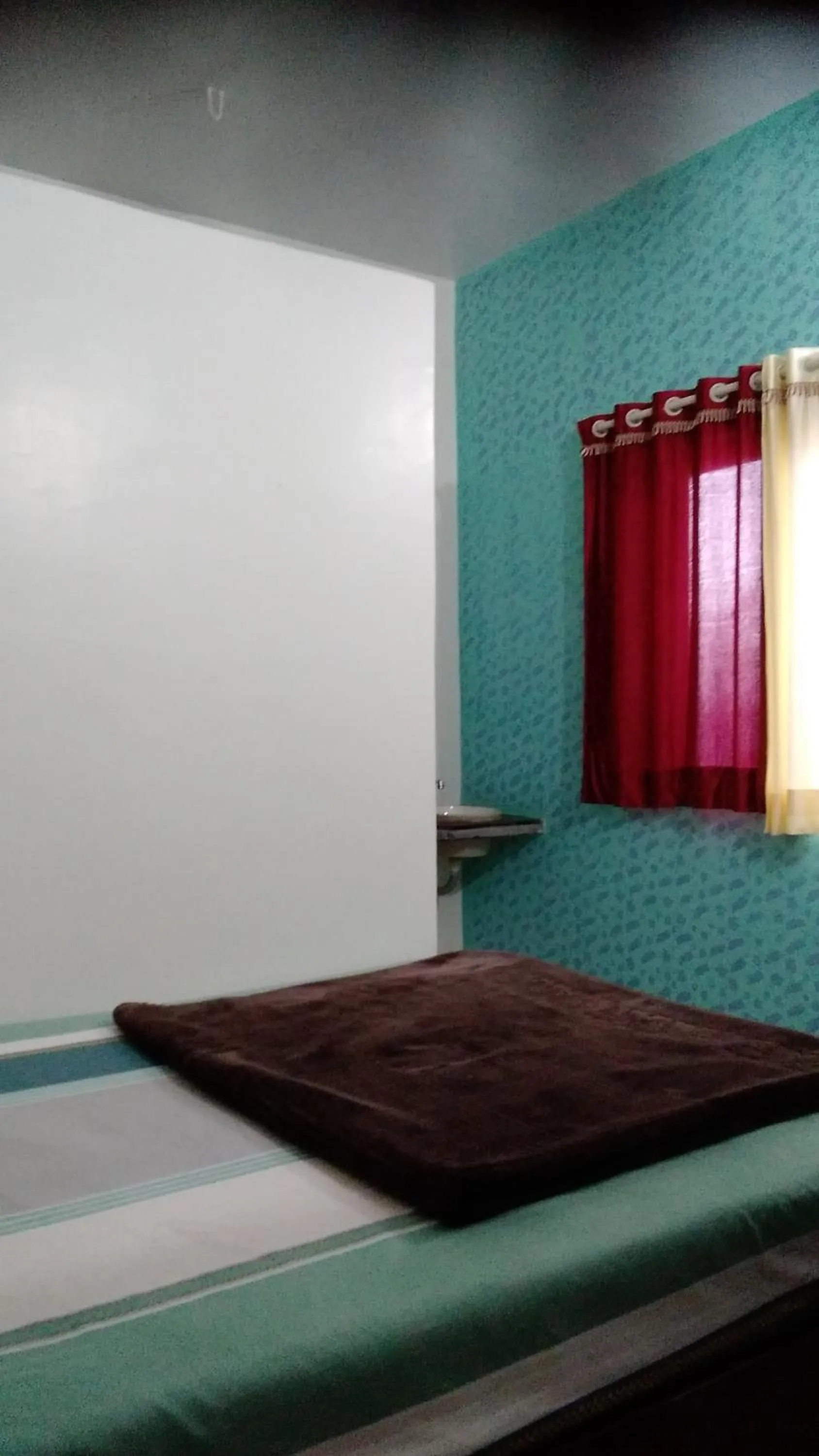 Bedroom in Om Datta Krupa Niwas Cottage