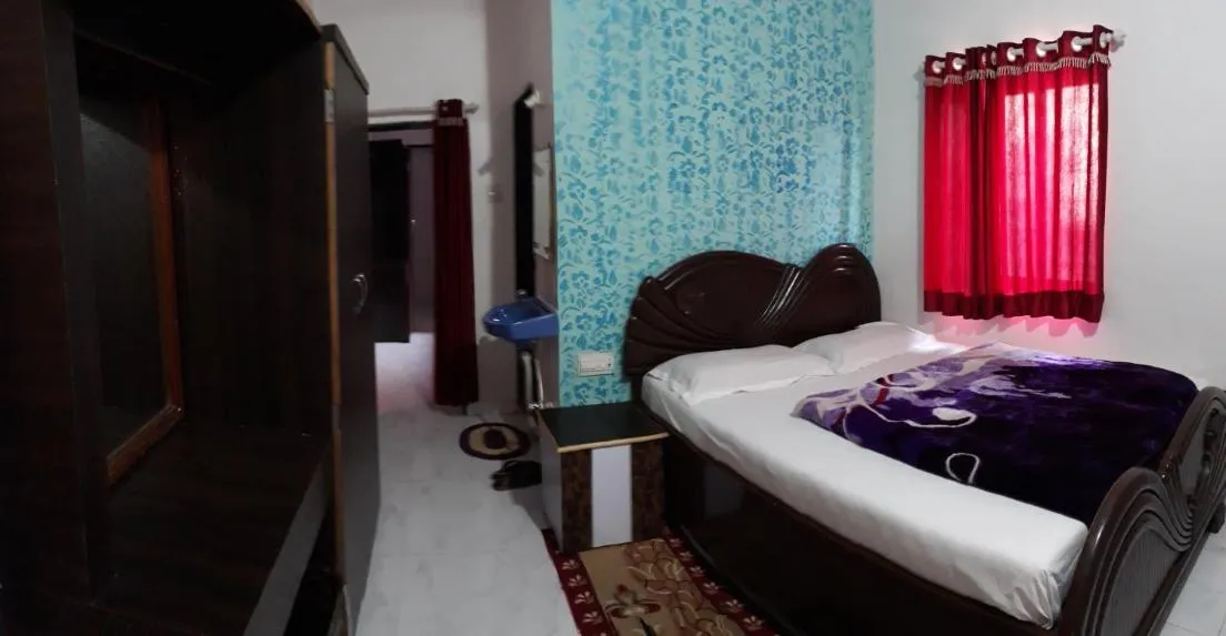 Bed in Om Datta Krupa Niwas Cottage