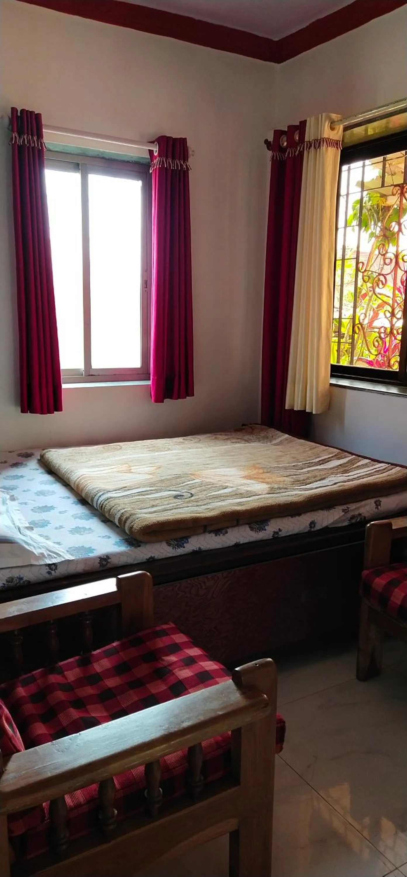 Bed in Om Datta Krupa Niwas Cottage