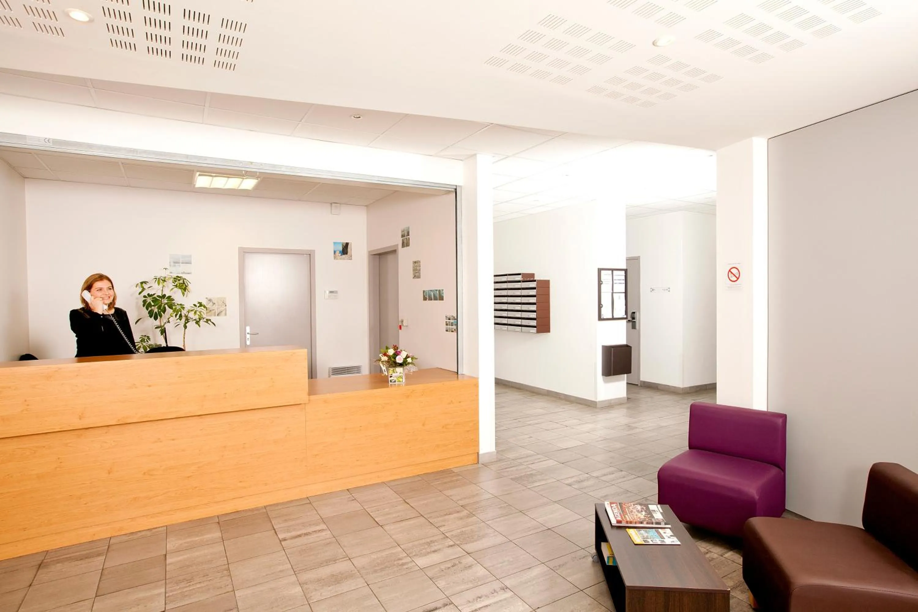 Lobby or reception in Séjours & Affaires Rennes Longs Champs