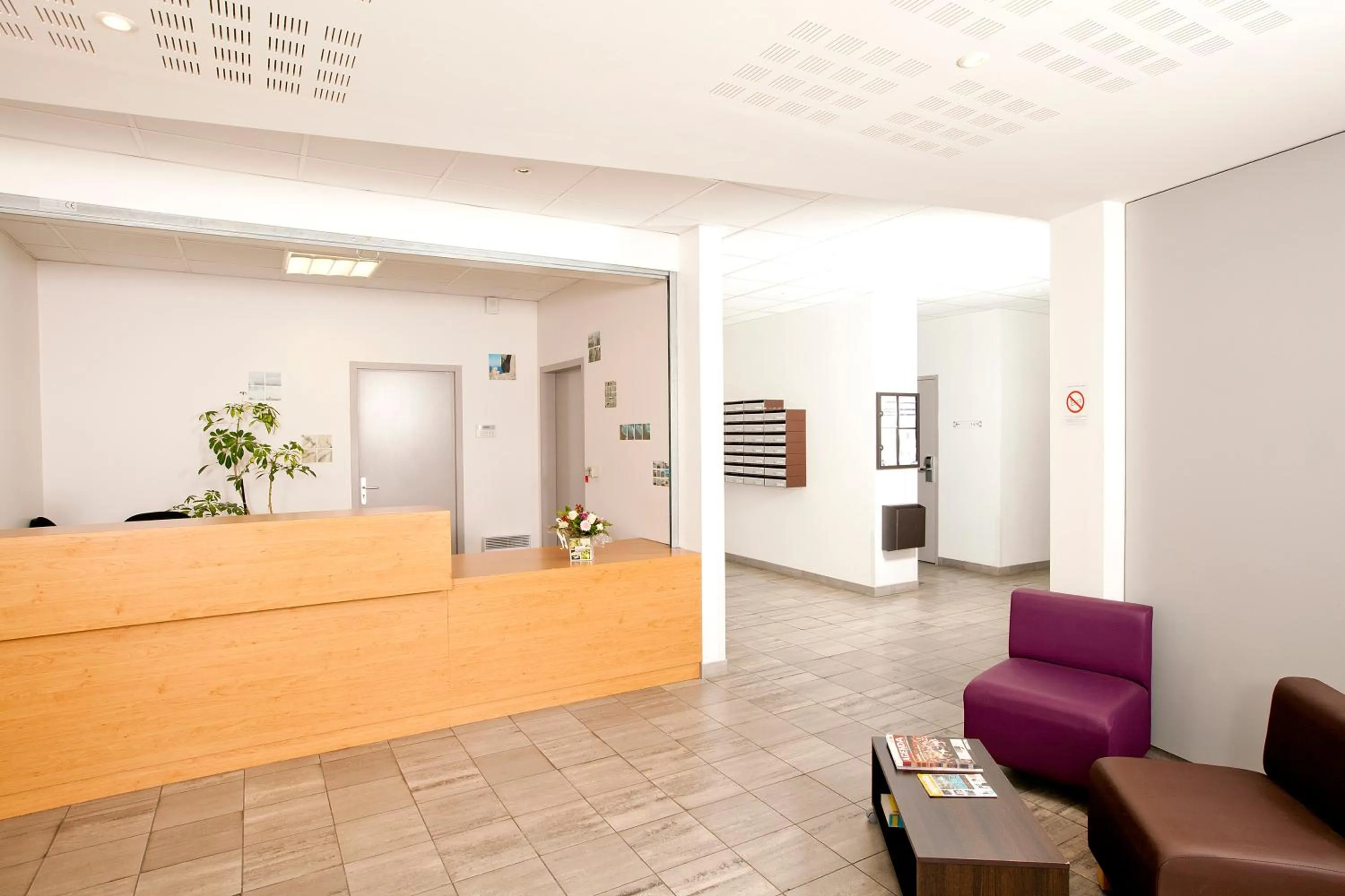 Lobby or reception in Séjours & Affaires Rennes Longs Champs