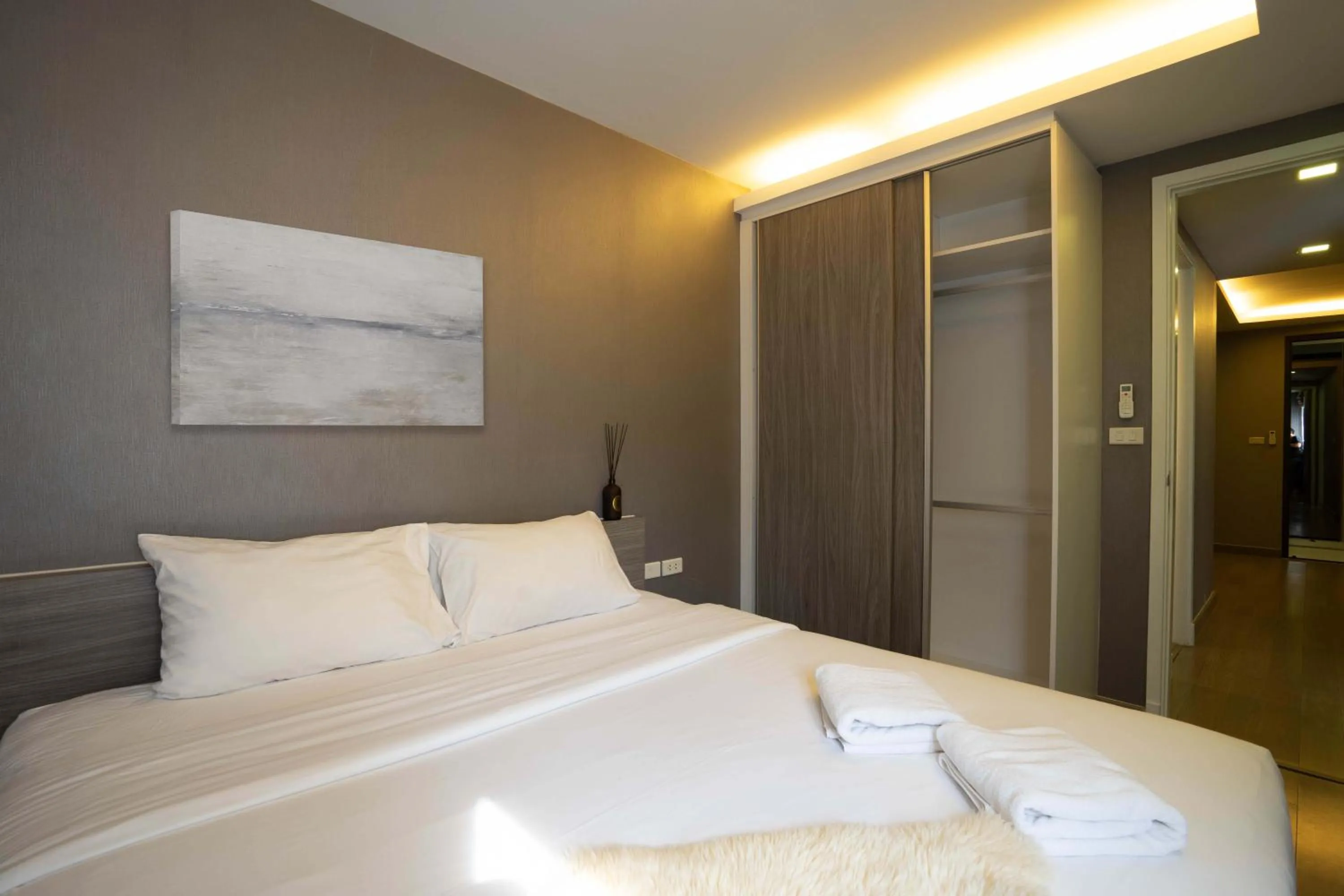 Bed in Dazzle Residence