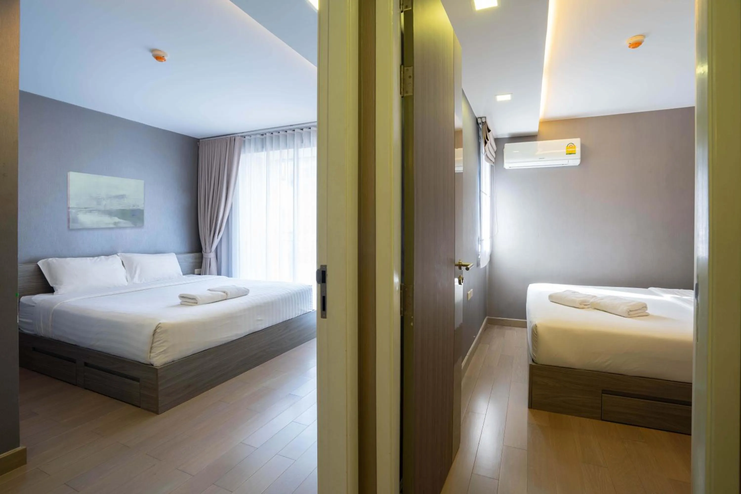 Bed in Dazzle Residence