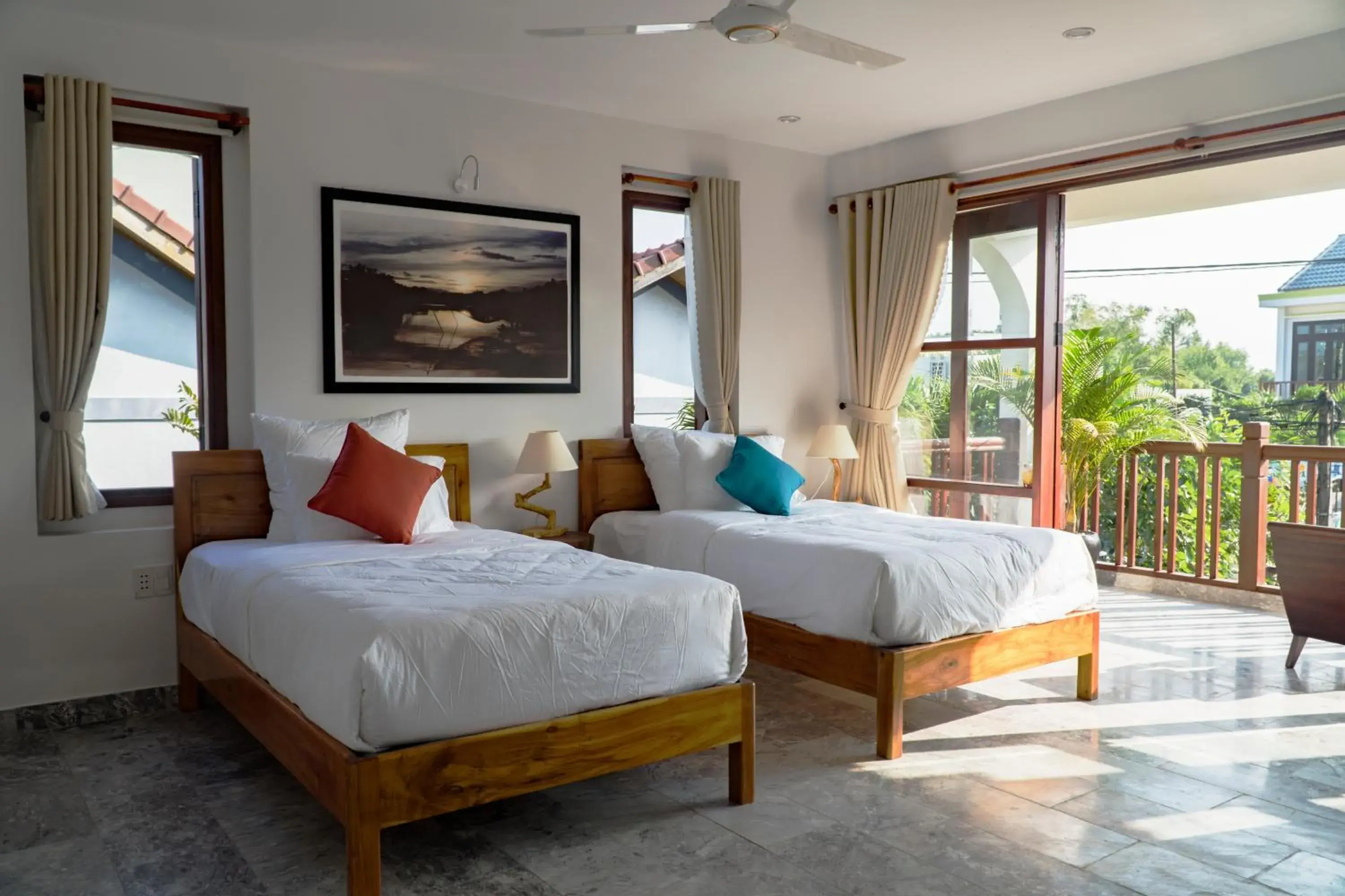 Triple Room with Balcony in Louis Villa Hoi An Triple Room with Balcony in Louis Villa Hoi An