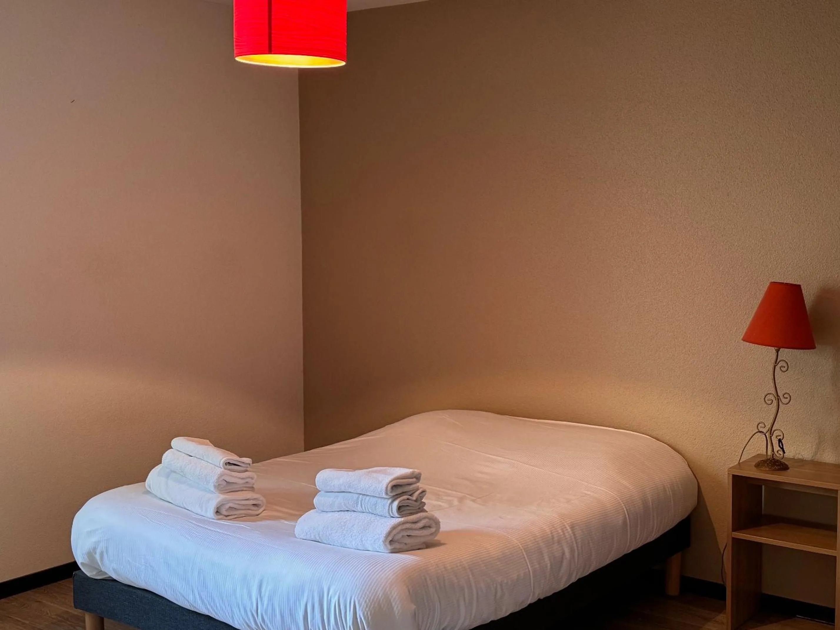 Bedroom in KOSY Appart'Hôtel 7ème Art