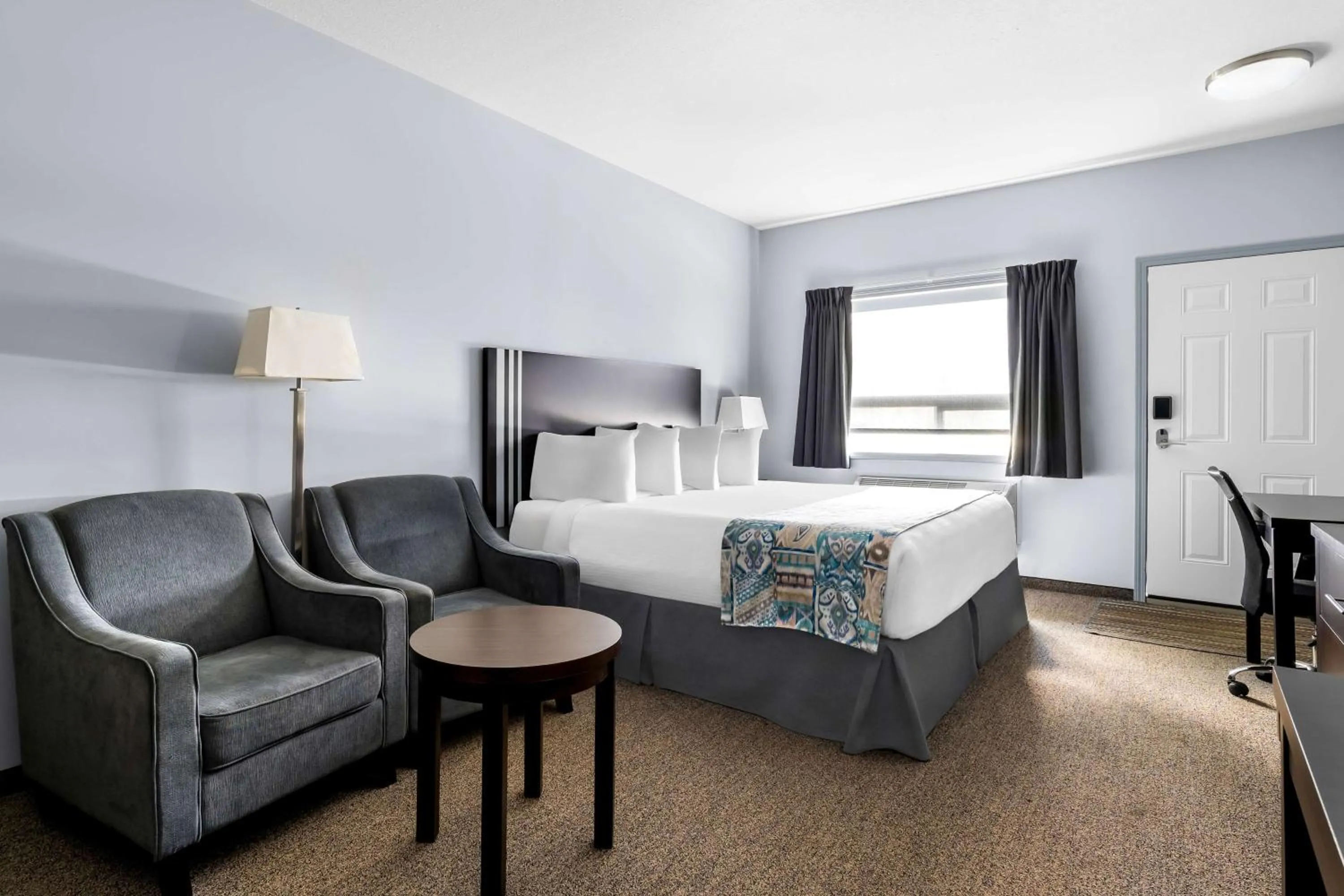 Bedroom, Bed in SureStay Studio by Best Western Hardisty